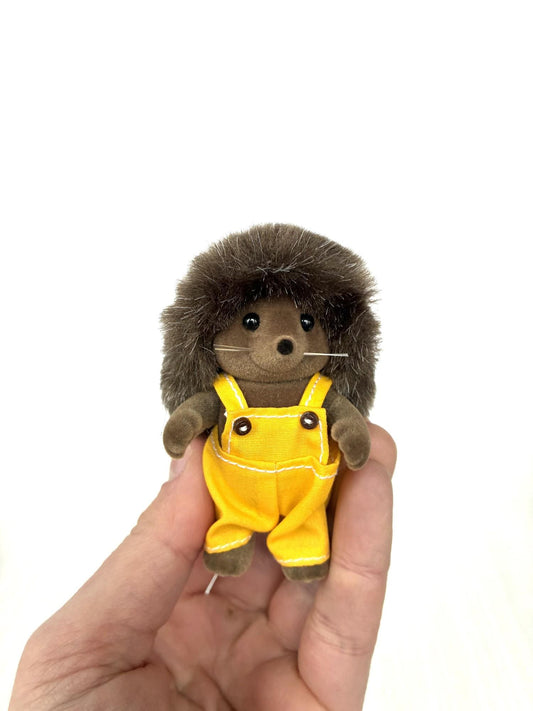 Calico Critters Sylvanian Families Pickleweeds Bramble hedgehog father in yellow dungarees, front view