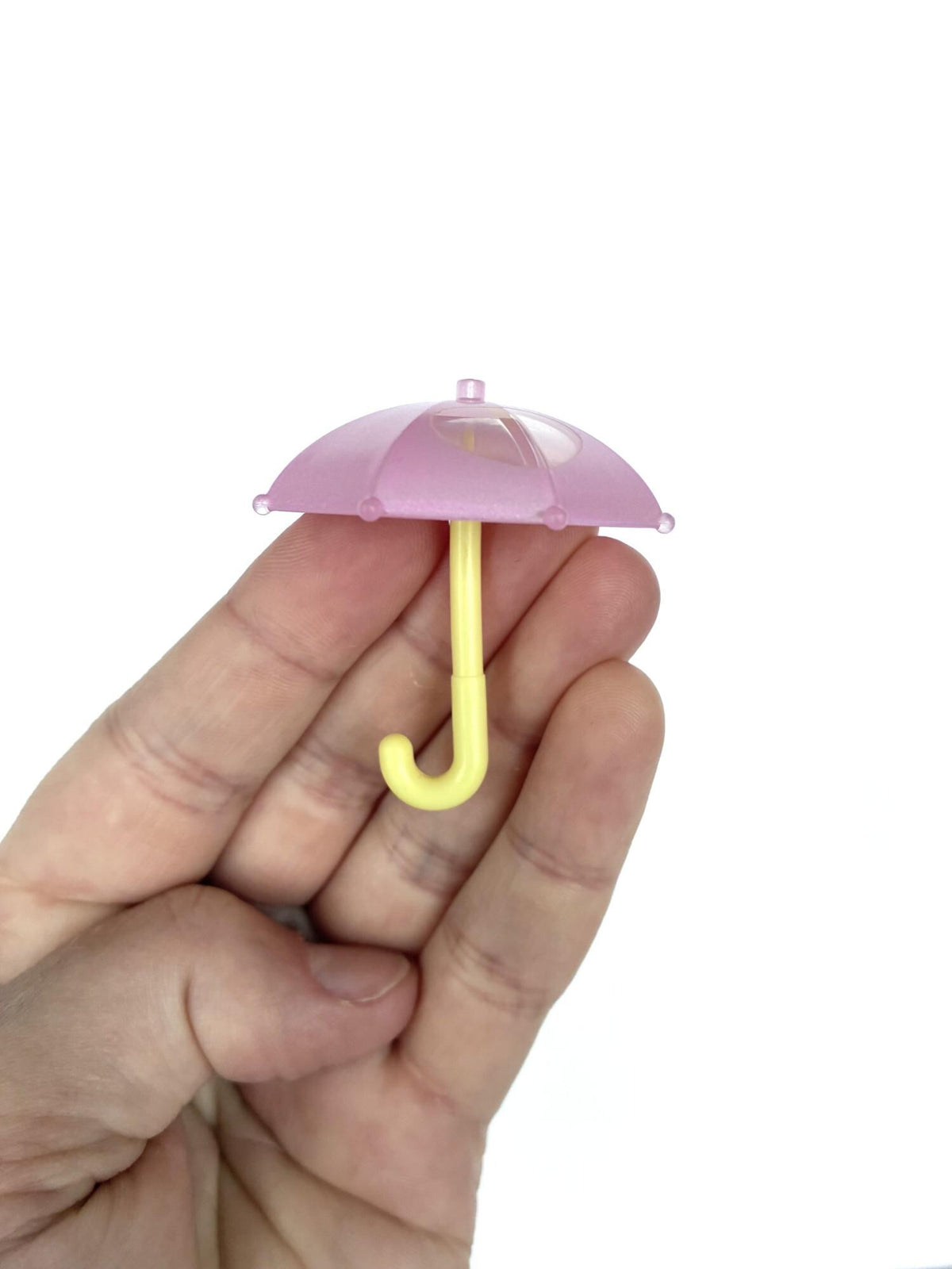 Calico Critters Sylvanian Families pink umbrella from above with yellow handle