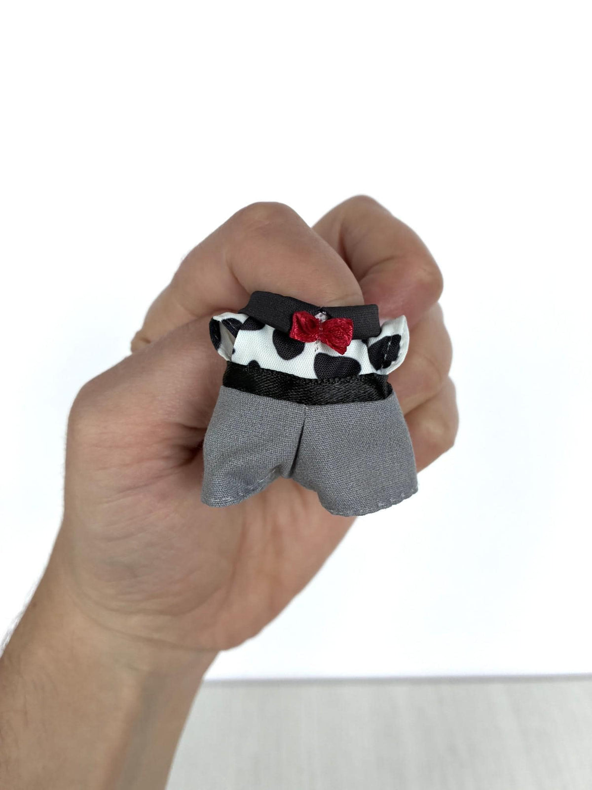 Calico Critters Sylvanian Families cow print collar top with red bow and grey trousers, dad outfit