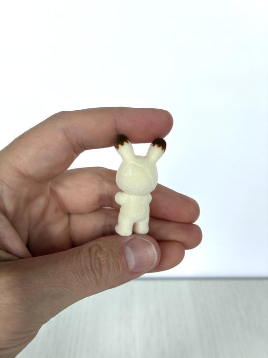 Calico Critters Sylvanian Families chocolate rabbit infant back view