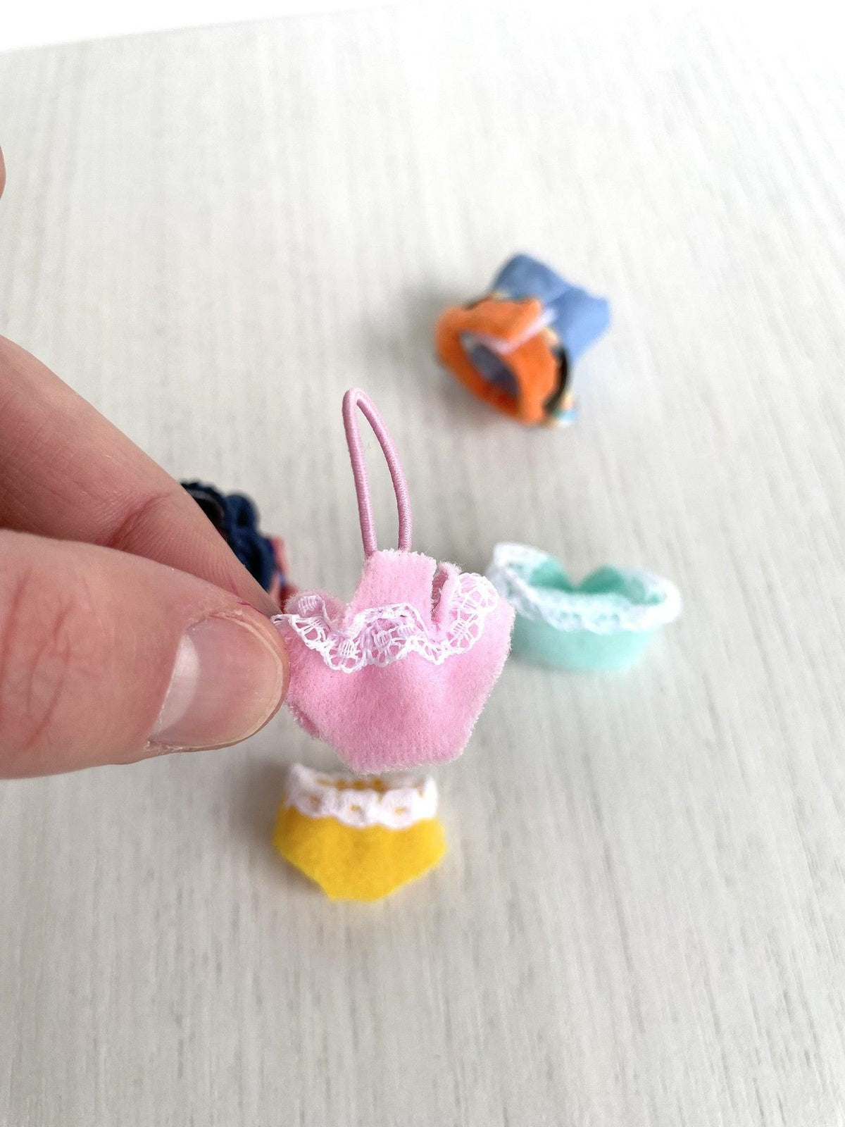 Calico Critters and Sylvanian Families spare baby outfit, pink diaper with elastic and lace trim held for detail