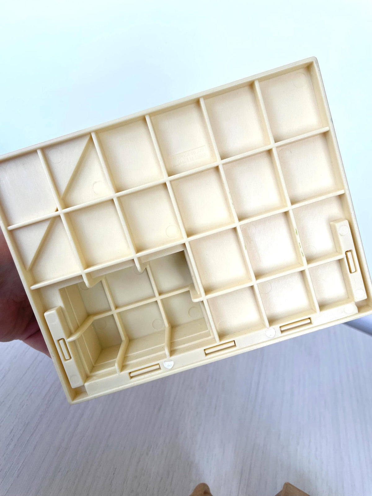 Underside of the J. Sainsbury Grocery Shop base showing clean undamaged plastic, Sylvanian Families Calico Critters