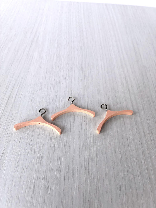Miniature peach clothes hangers with silver hooks for Calico Critters and Sylvanian Families clothes – photo 1 of 4