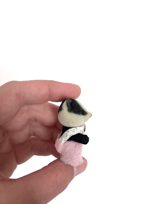 Calico Critters Sylvanian Families badger baby, side profile view