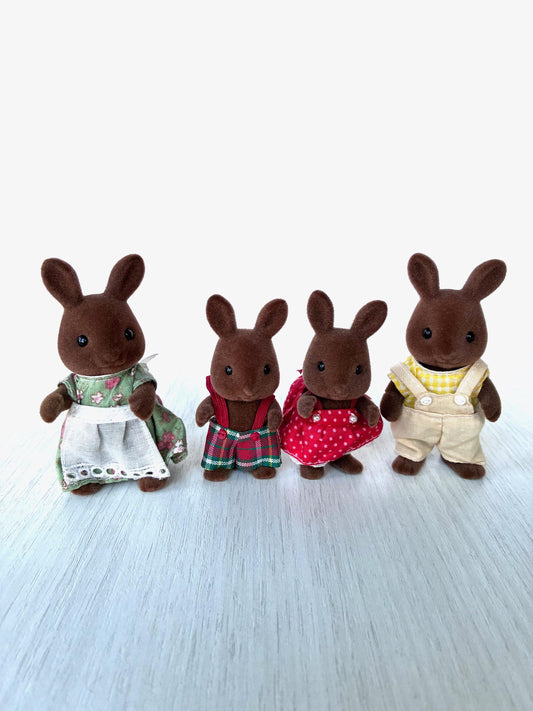 Calico Critters Brown Wildwood Rabbit Family, vintage Sylvanian Families set of four: mother, brother, sister and father in original outfits, front view