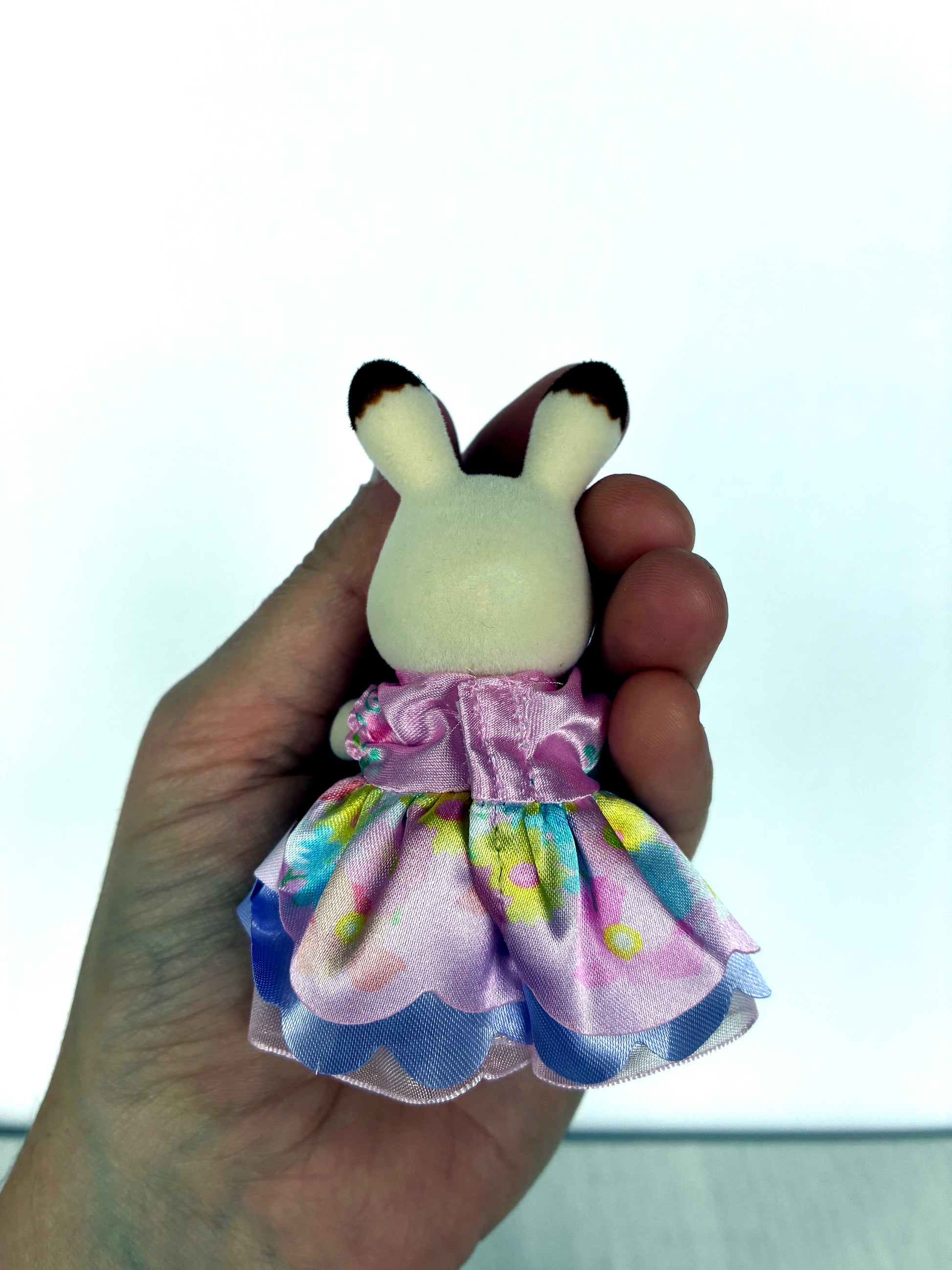 Back view of flower petal princess dress on Chocolate Rabbit girl