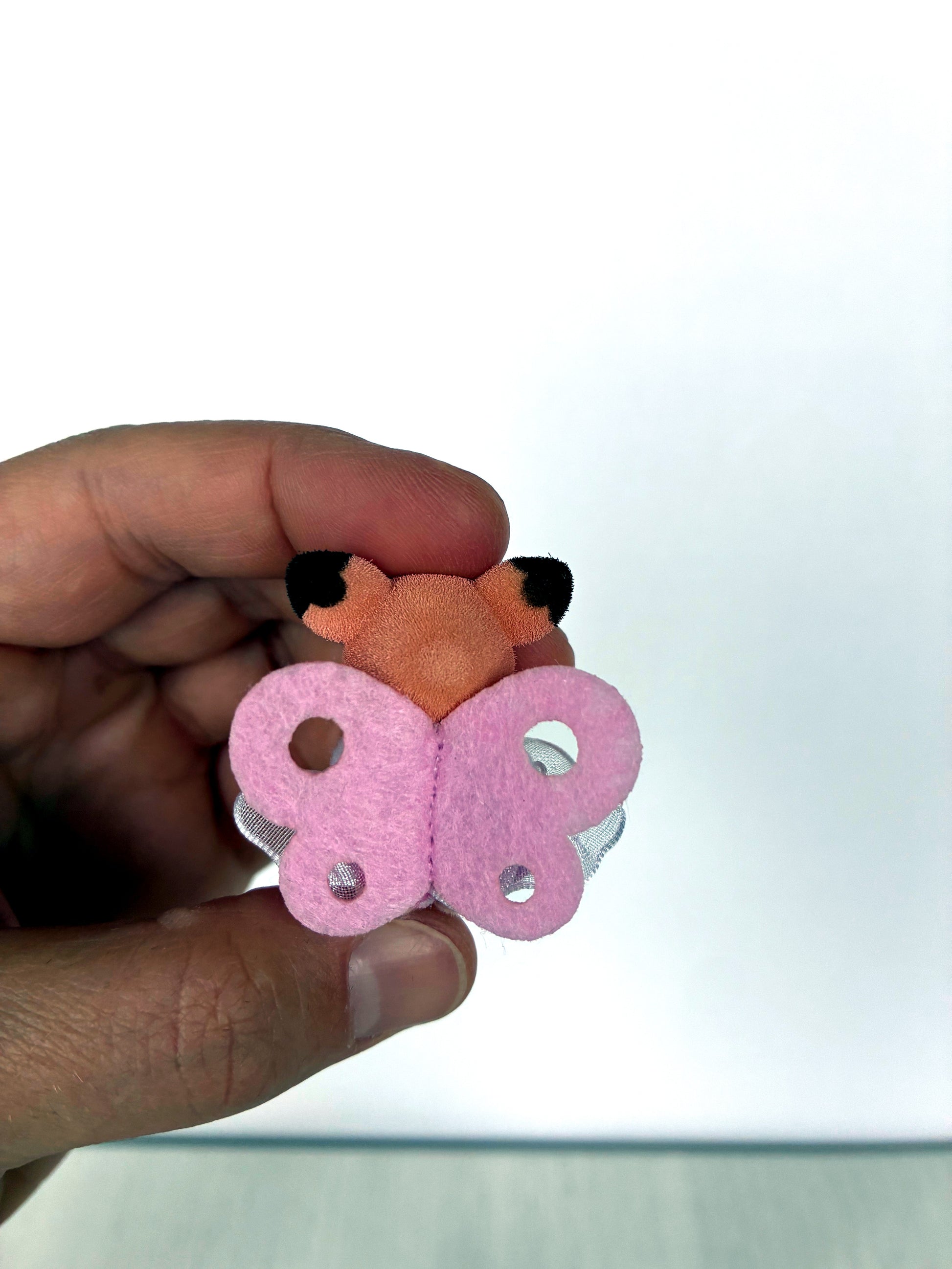 Back view of pink butterfly wings on Deer baby