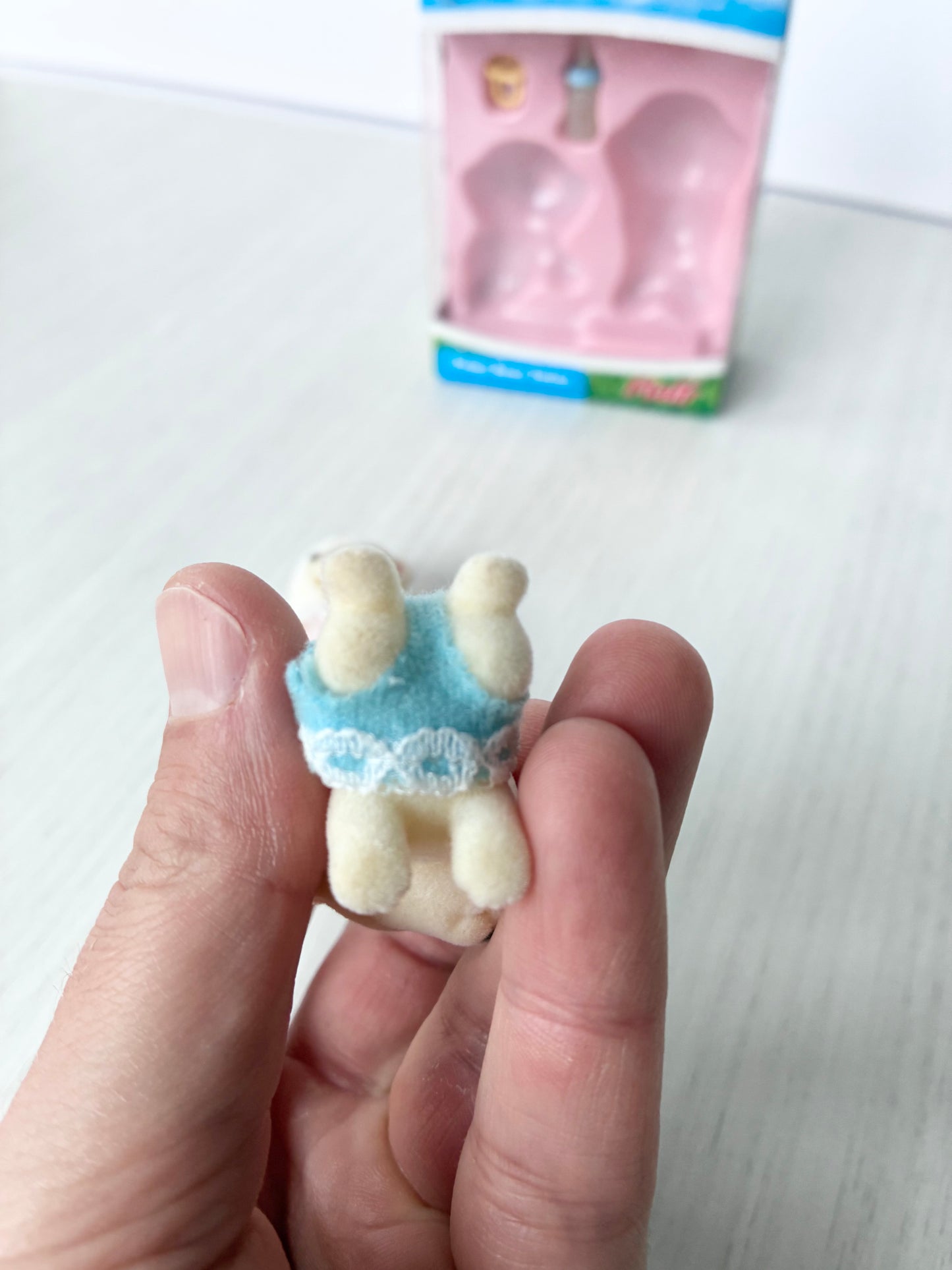 Back view of Calico Critters Sylvanian Families polar bear baby