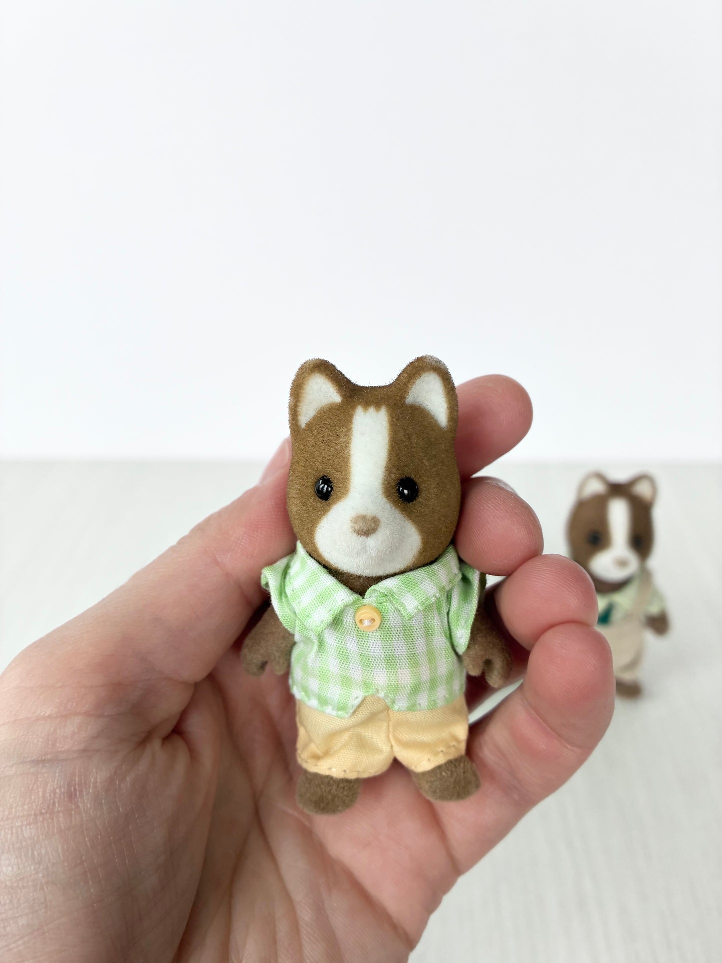 Calico Critters Sylvanian Families hound dog father figure in green checked shirt