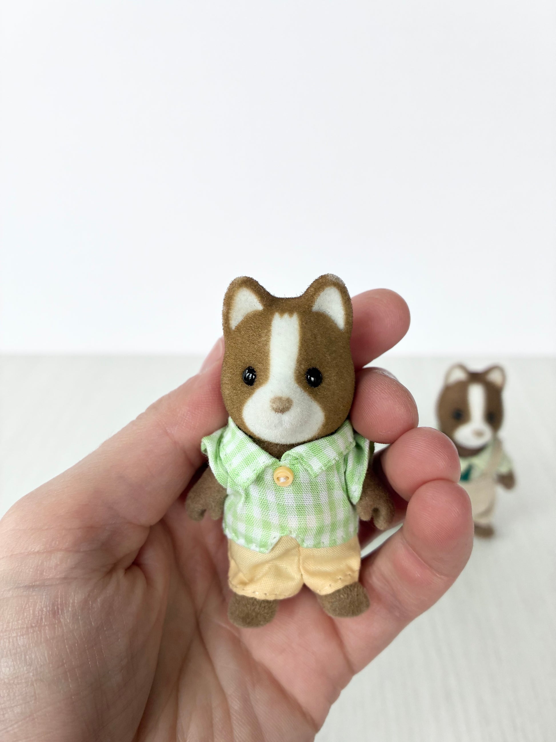 Calico Critters Sylvanian Families hound dog father figure in green checked shirt