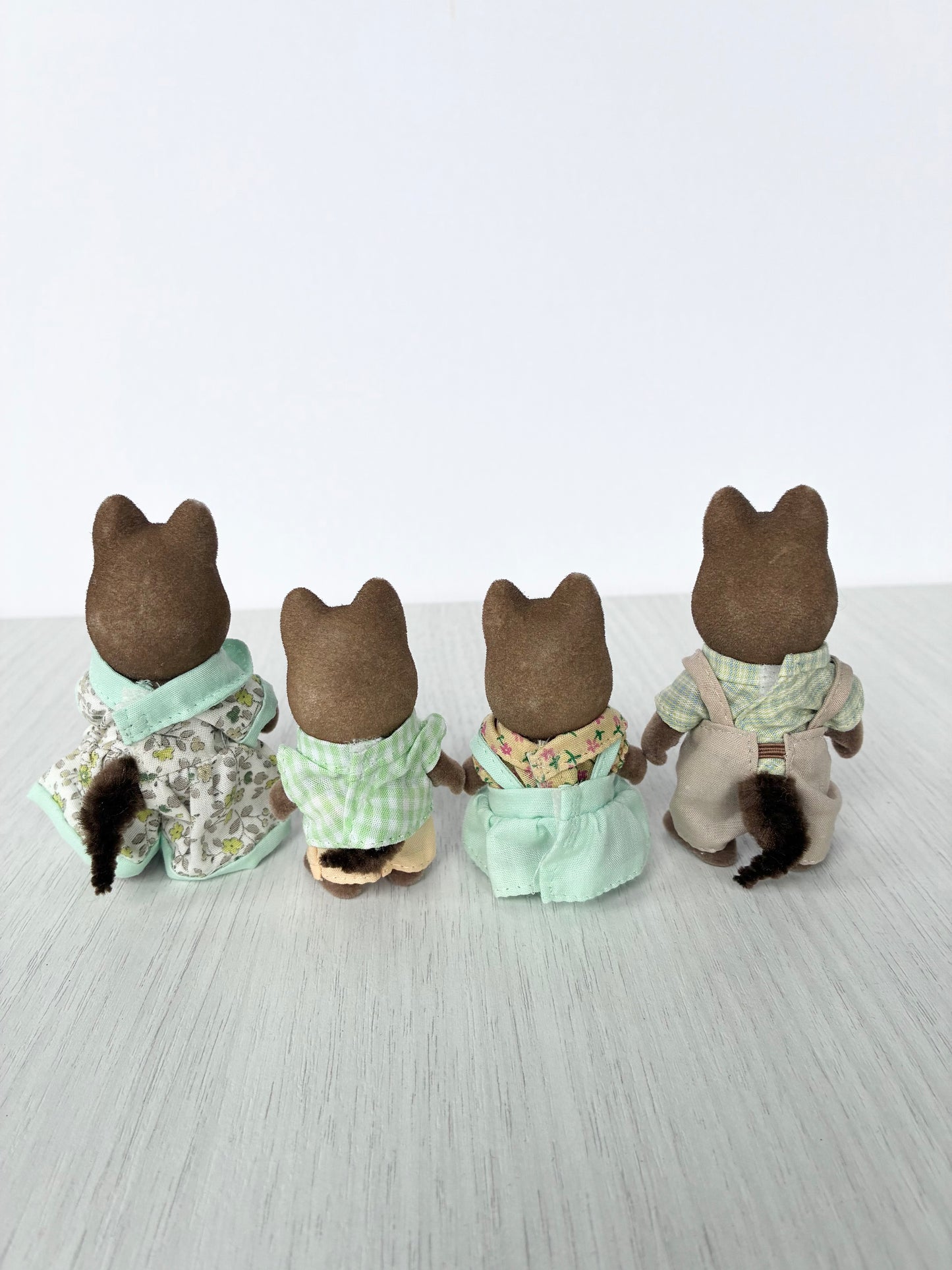 Back view of Calico Critters Sylvanian Families hound dog family of four