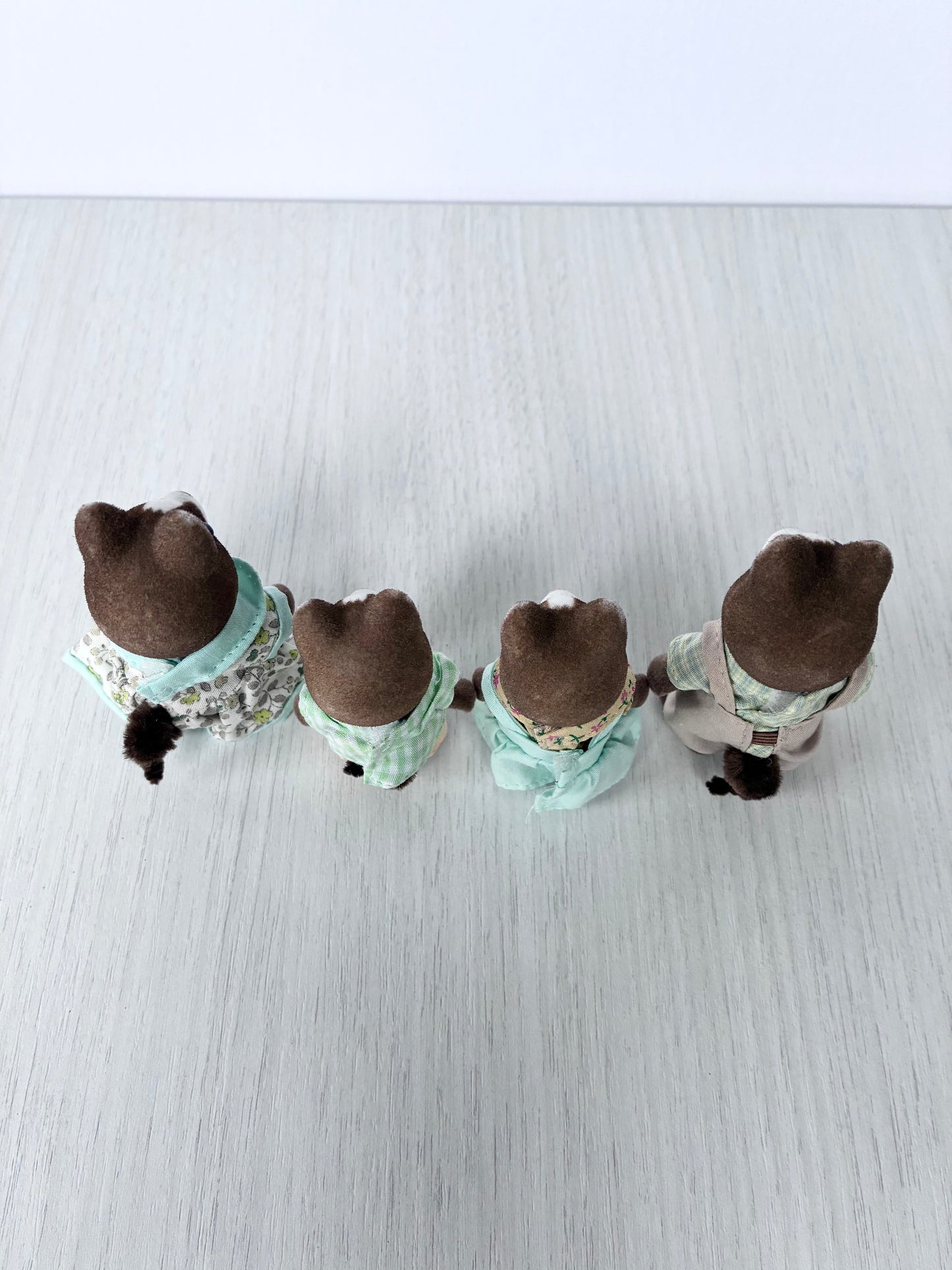 Calico Critters Sylvanian Families hound dog family shown from behind