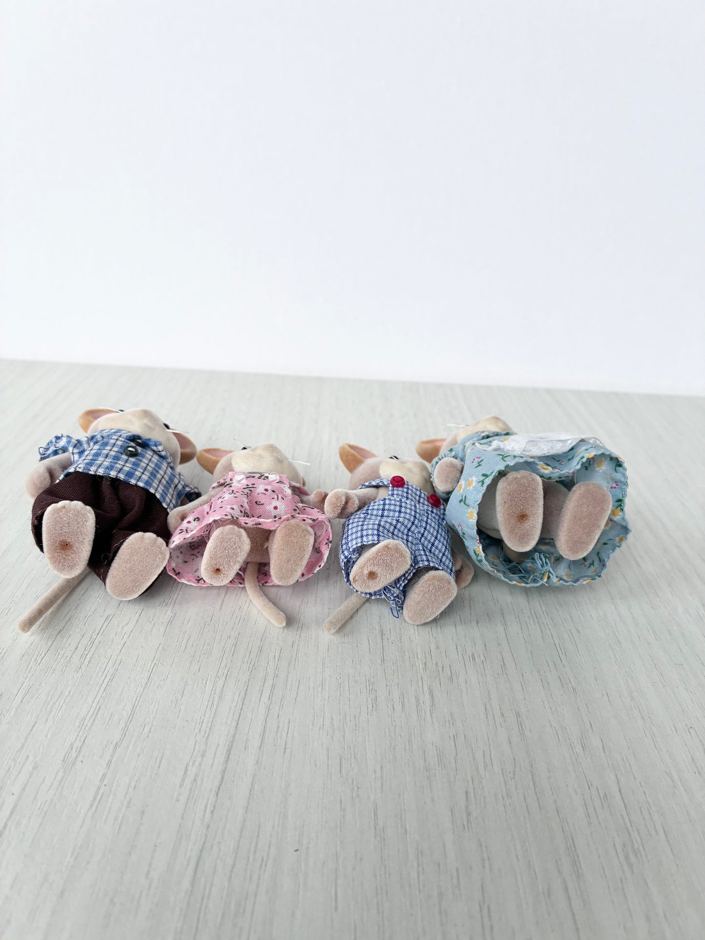 Back view of Calico Critters Sylvanian Families mouse family of four