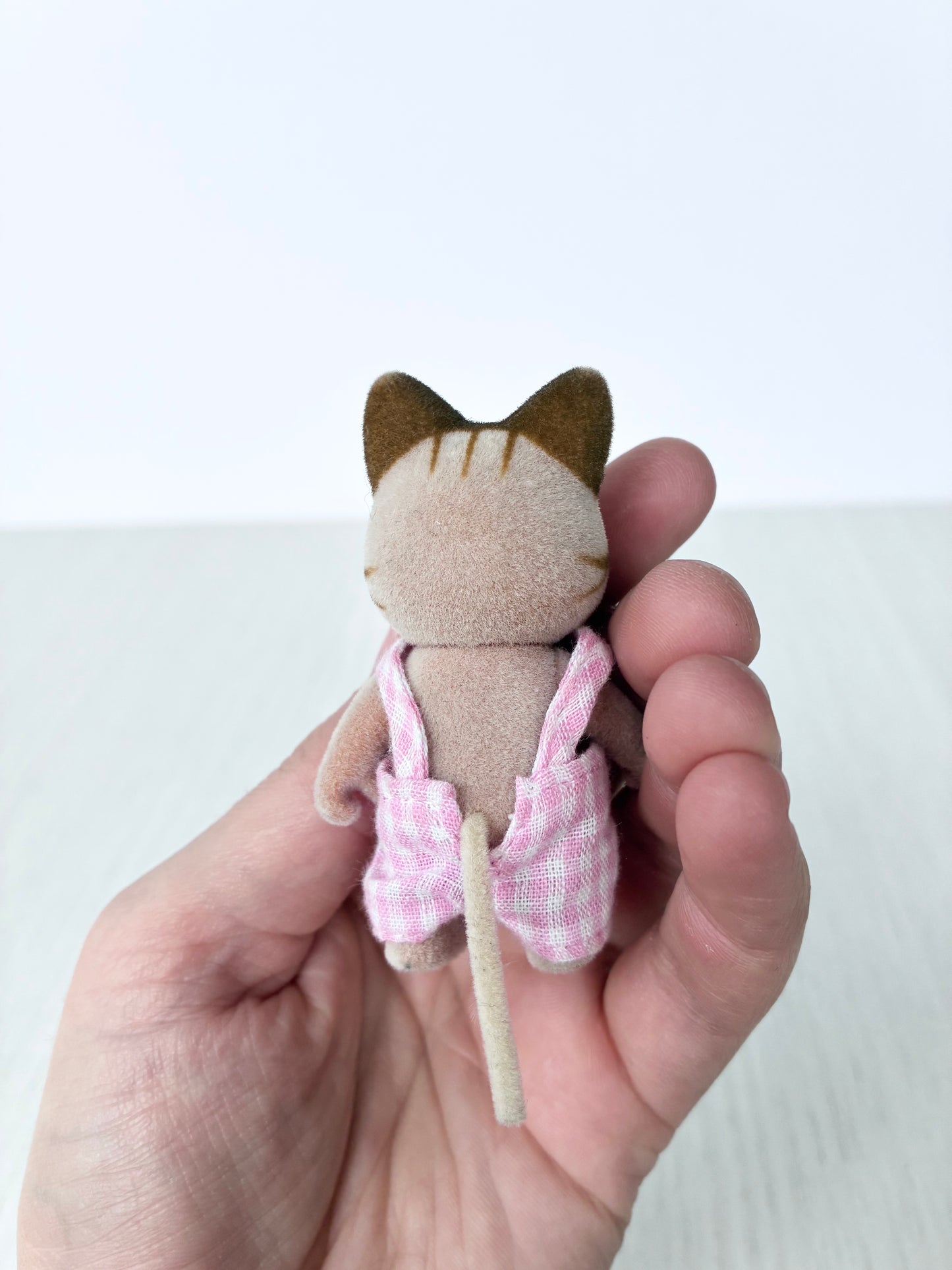 Back view of Calico Critters Sylvanian Families tabby cat boy