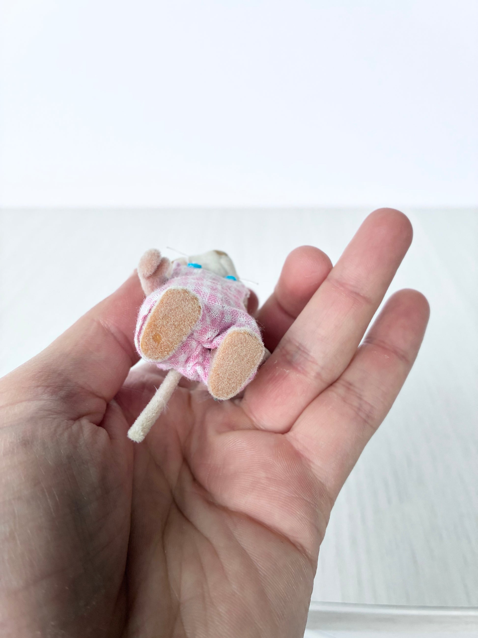 Calico Critters Sylvanian Families tabby cat boy in hand for scale