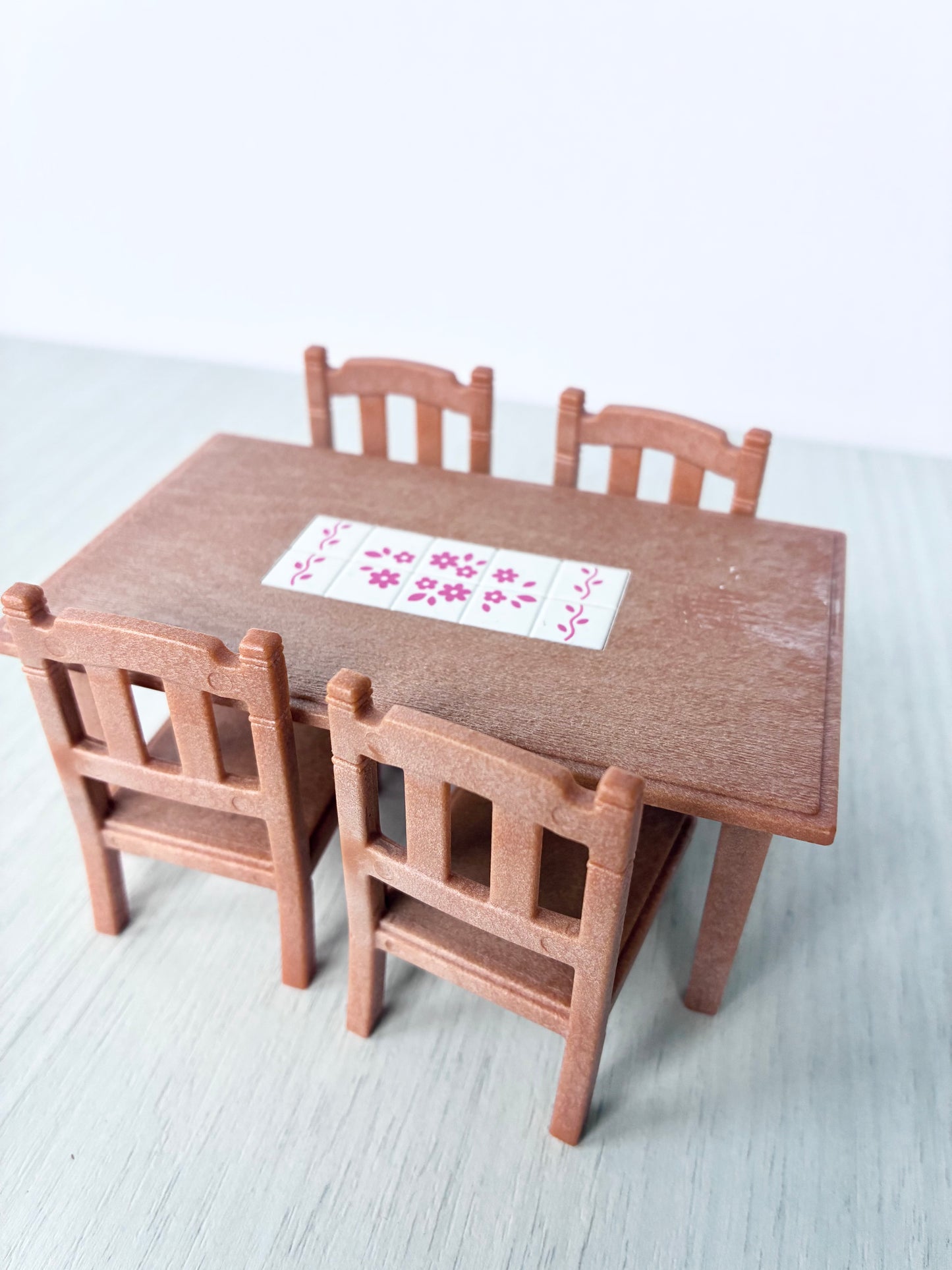 Calico Critters Sylvanian Families dining table and chairs set shown from the side