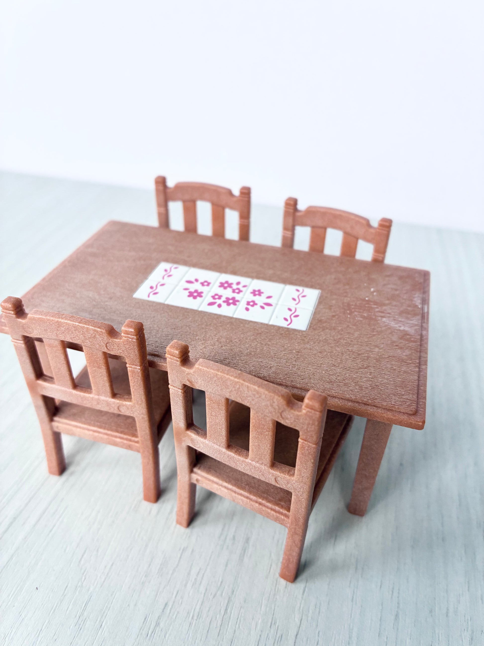 Calico Critters Sylvanian Families dining table and chairs set shown from the side