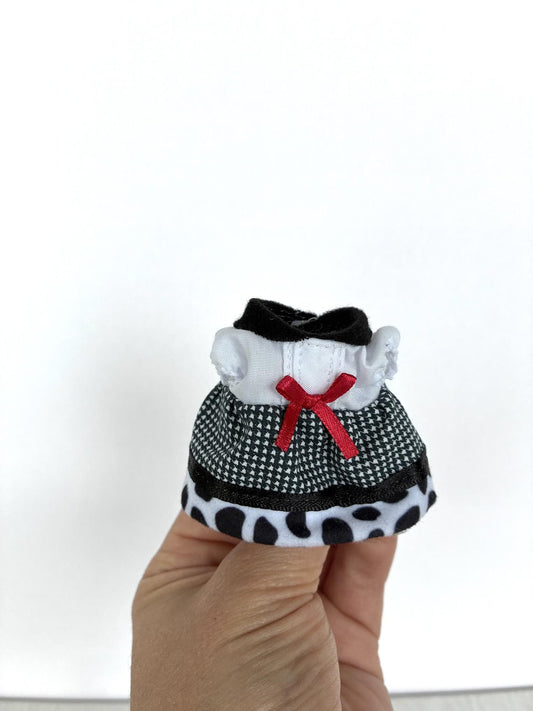 Calico Critters Sylvanian Families black houndstooth mom dress with red bow and cow print hem, front