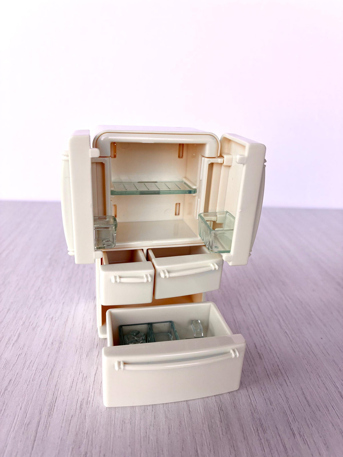 Miniature dollhouse fridge freezer, Calico Critters Kitchen Play Set, Sylvanian Families - doors and drawers open showing the clear shelf and ice bucket