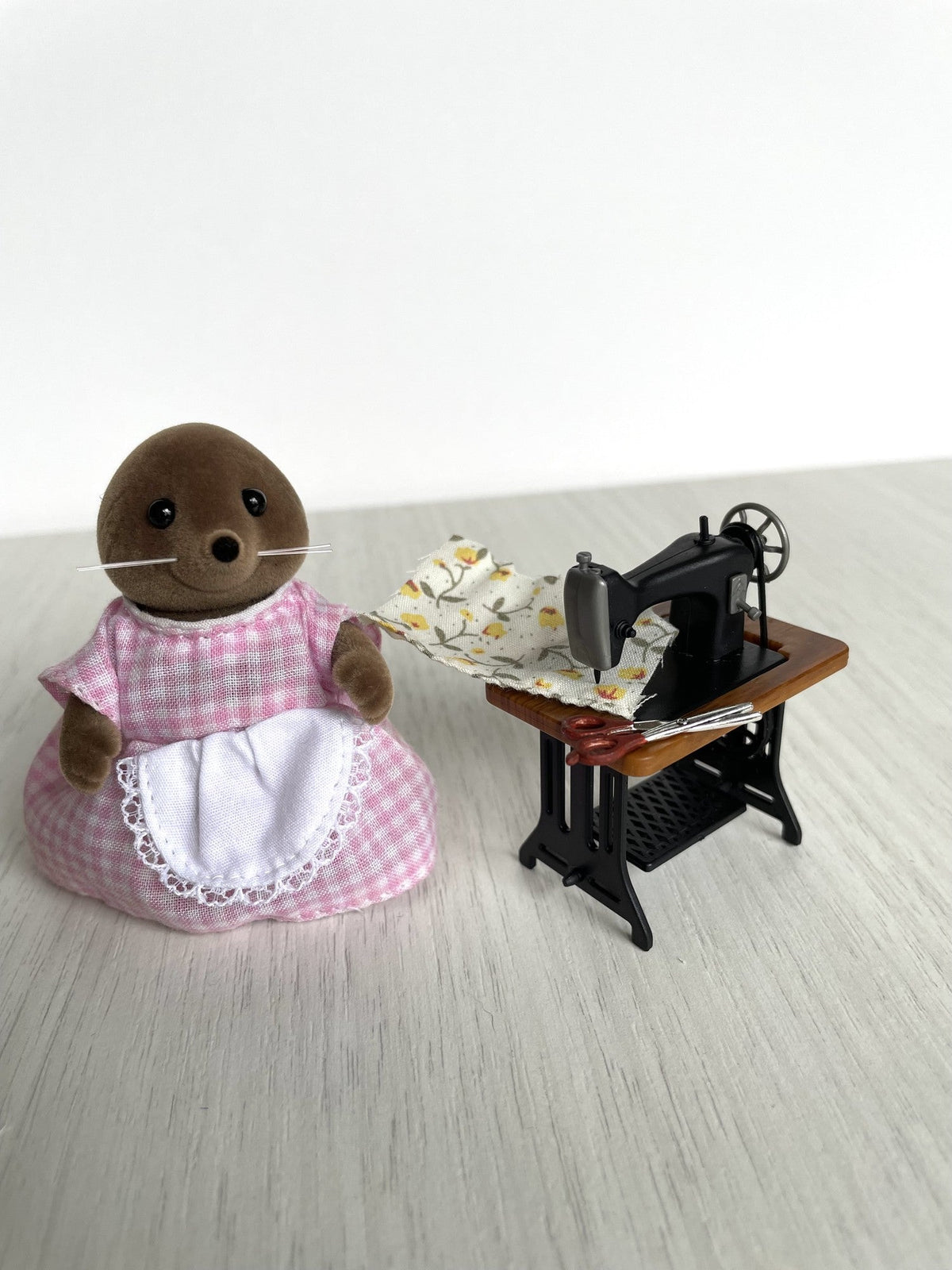 Shown beside a Calico Critters and Sylvanian Families mole figure for scale comparison only — figure not included