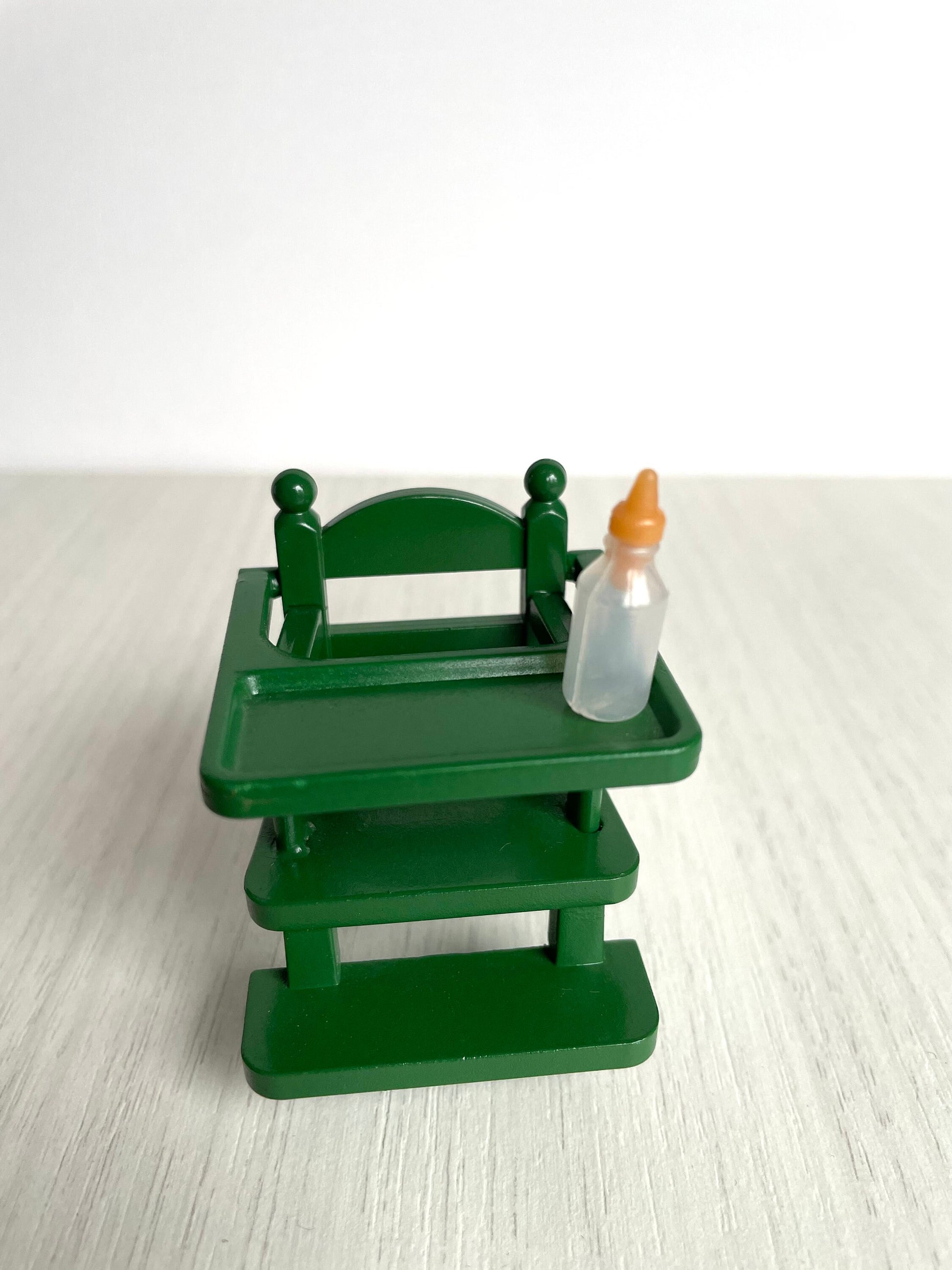 Green high chair with bottle — vintage Sylvanian Families / Calico Critters