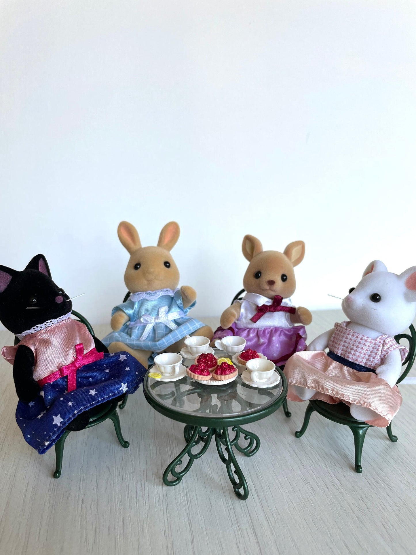 Calico Critters tea party custom set with kangaroo mom, sunny rabbit, marshmellow mouse, midnight cat, tea cups, food pastries and table.