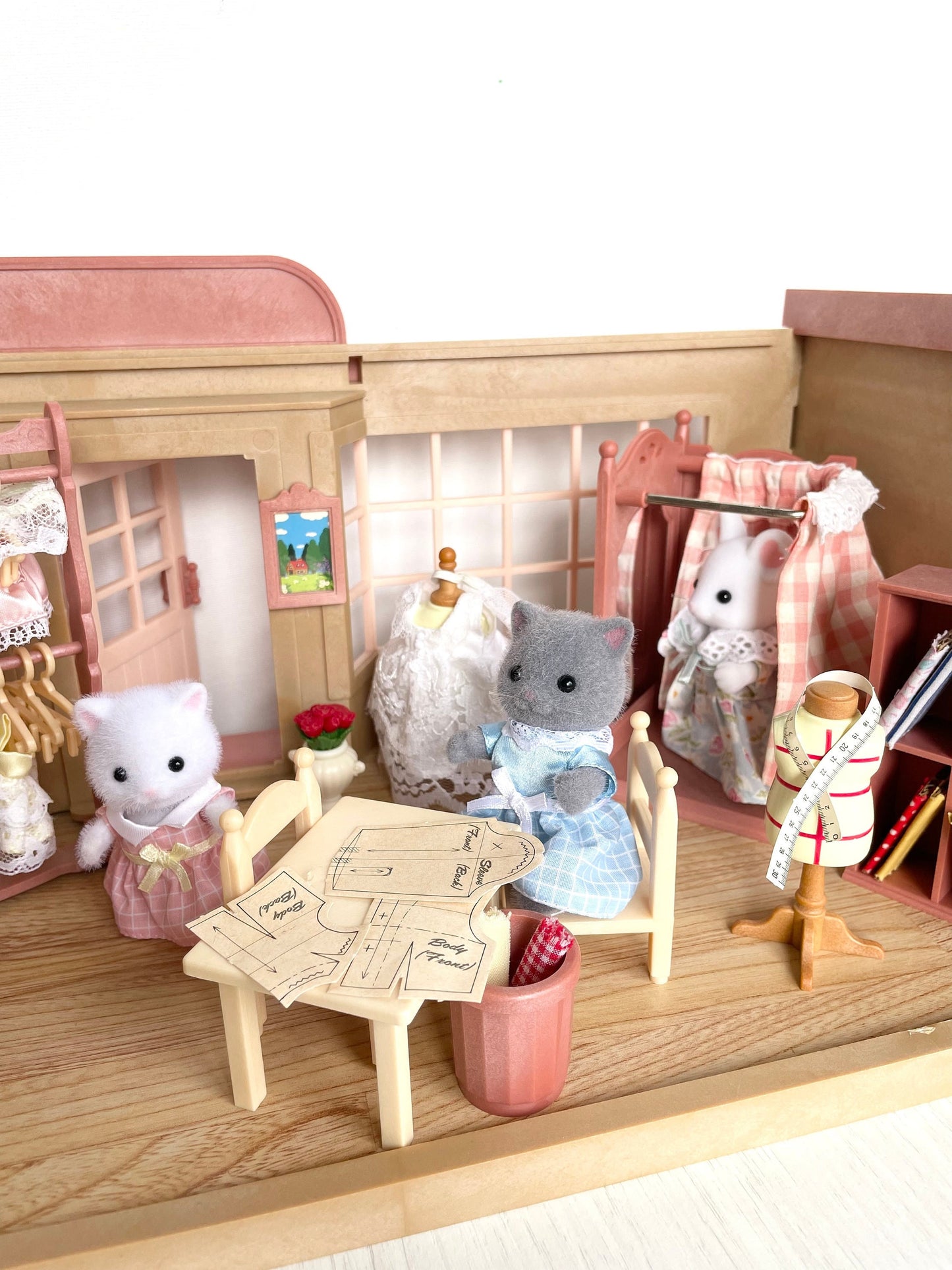 Calico Critters Village Boutique, boxed and complete set with extra critters. Sylvanian Families vintage clothing store In excellent condition. Perfect Easter gift for a little girl or adult collector!