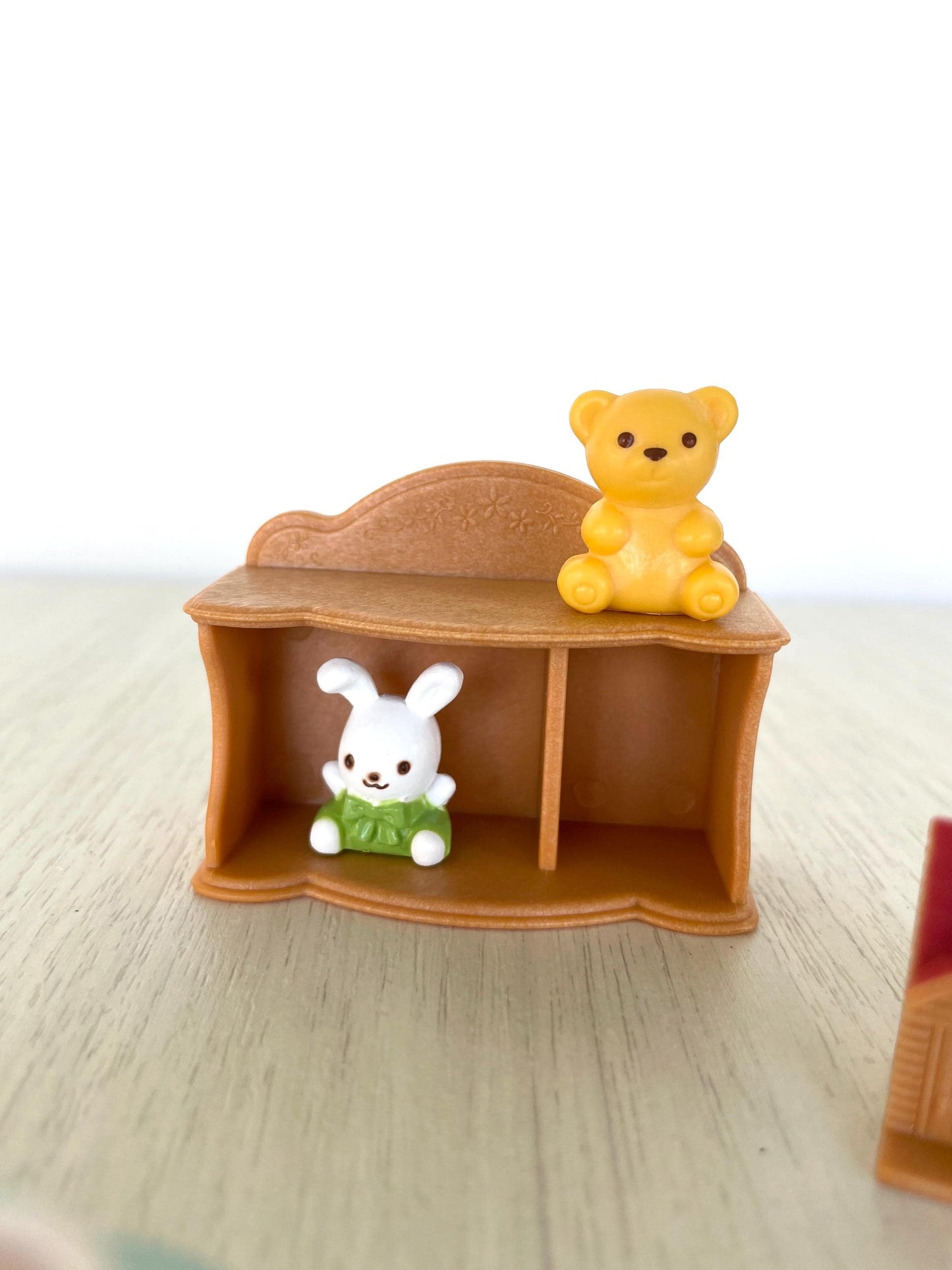 Calico Critters baby toys and tea party set with mini toy house, tea cups and kettle, cookies, little blue table, bookshelf, toy stuffies — Sylvanian Families