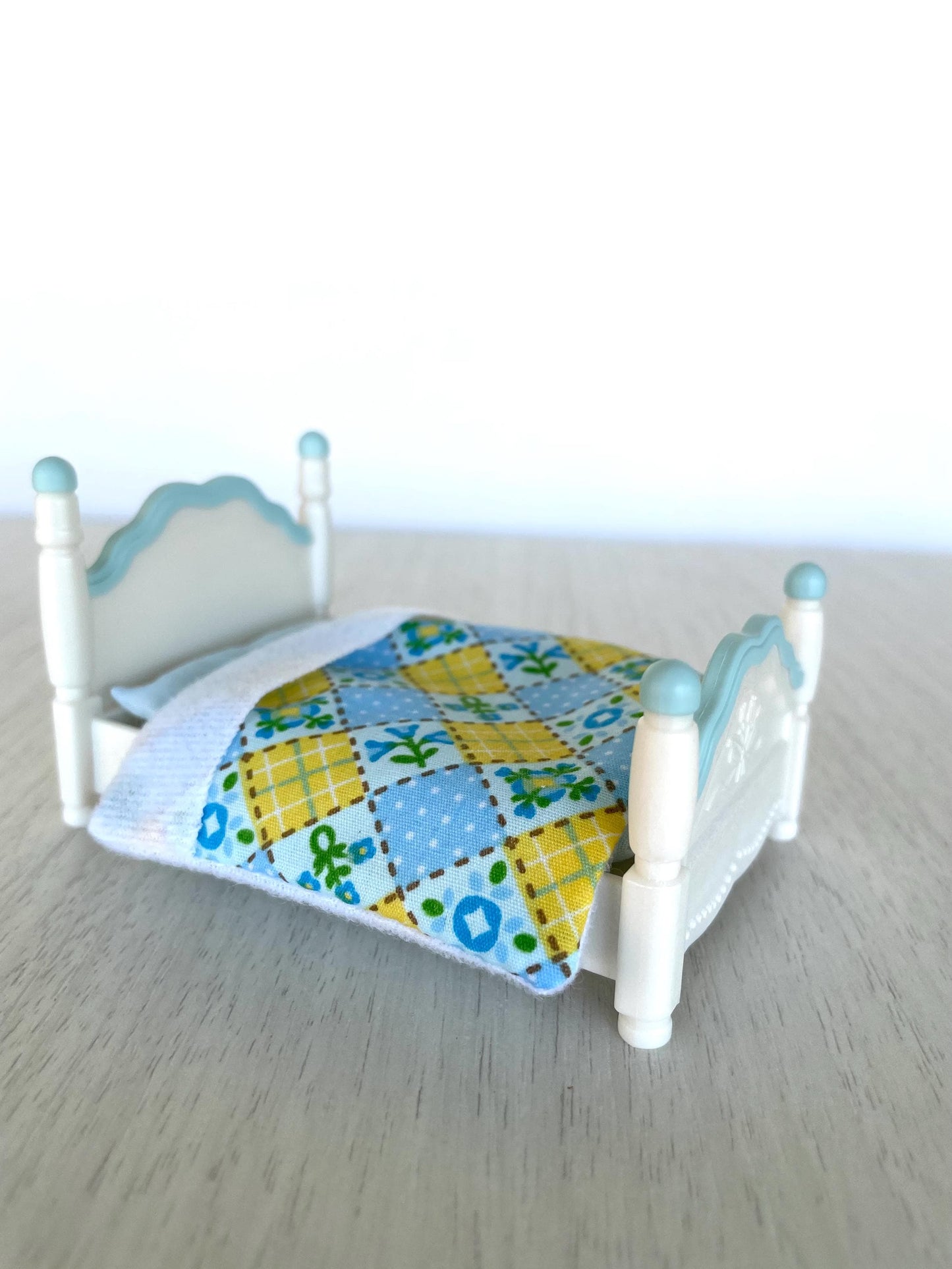 Calico Critters kid bed with blue details, blanket & mattress.  Epoch replacement parts for bedroom