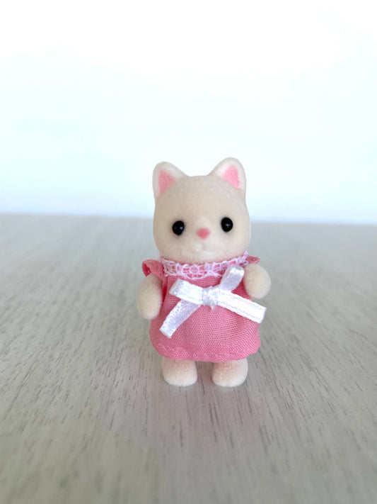 Calico Critters Silk Cat Baby, jointed standing baby, new out of package adorable Collectible Toy that can stand or sit. Cute little pink outfit with a bow and lace trim. Ni-89