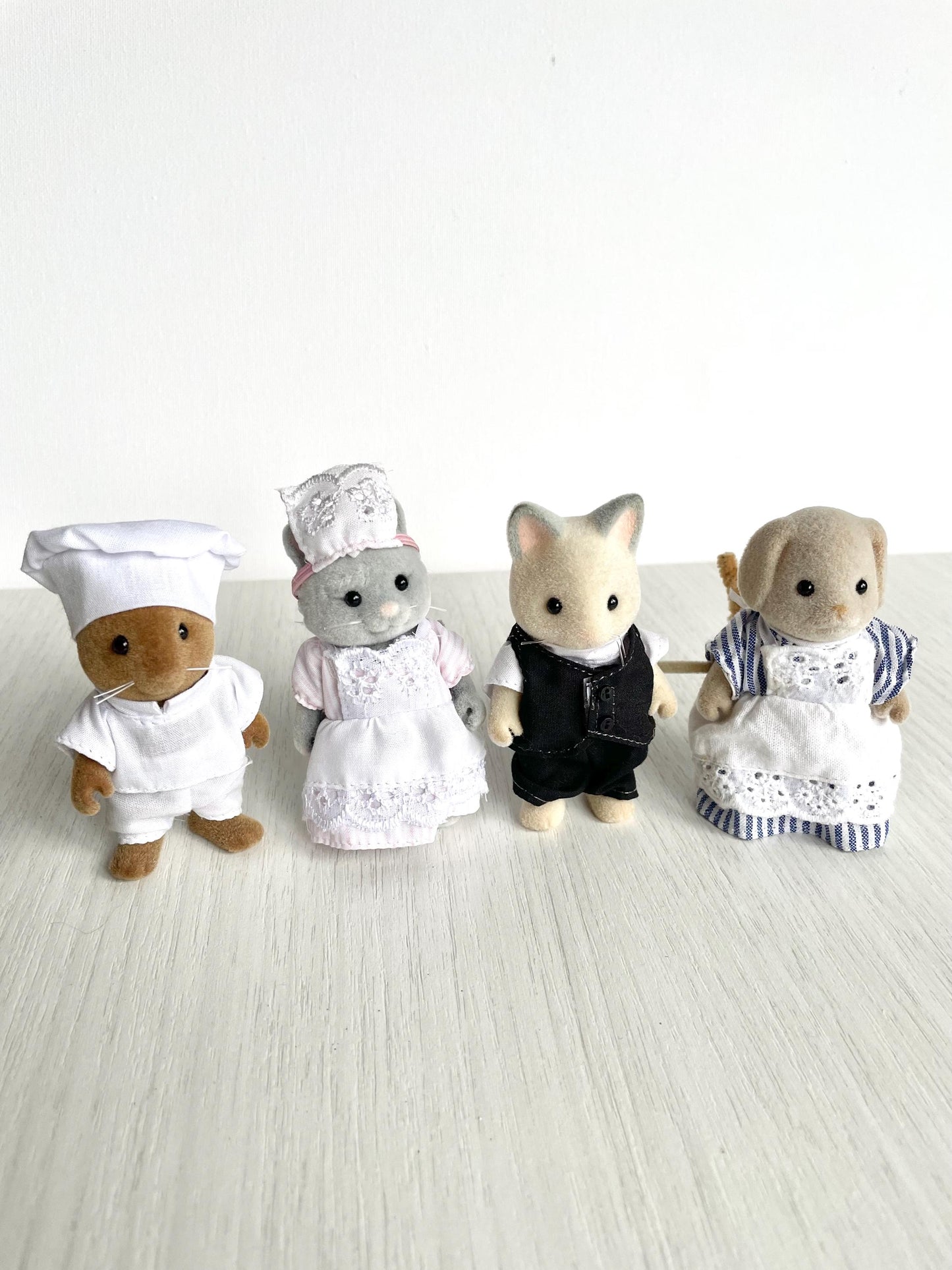 Vintage Sylvanian Families Grand Hotel staff figures — Basil chef, Simpkins maid, Cheshire butler, Mrs Basset — Calico Critters