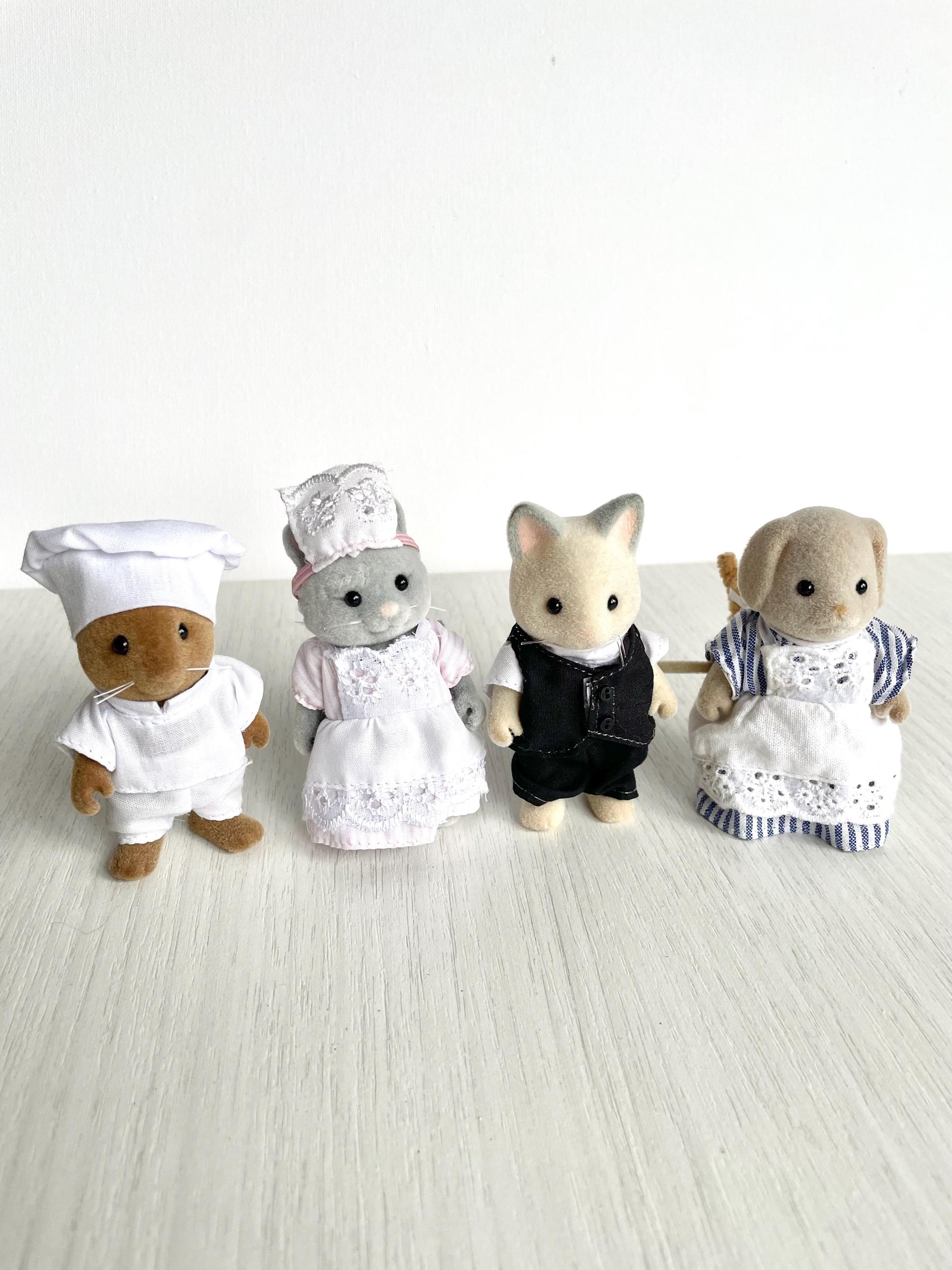 Vintage Sylvanian Families Grand Hotel staff figures — Basil chef, Simpkins maid, Cheshire butler, Mrs Basset — Calico Critters