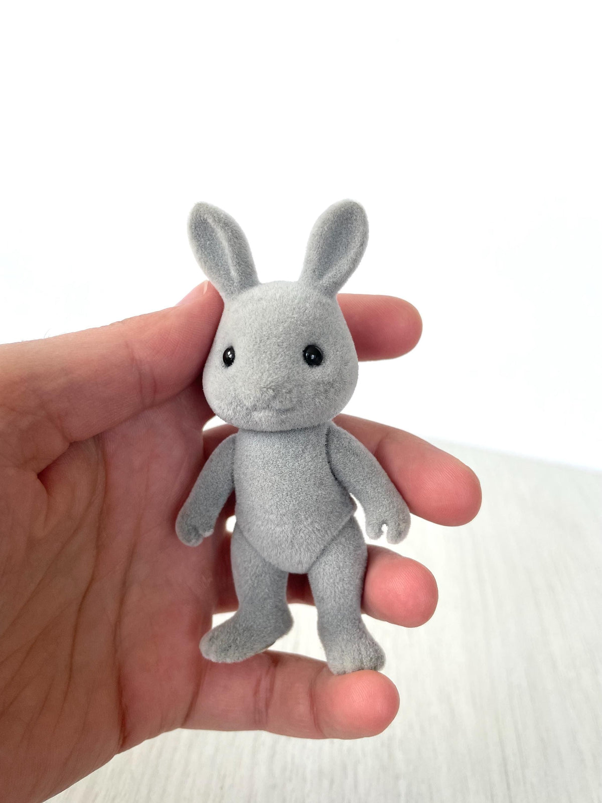 Vintage Rabbit toy figurine for pretend play, Gray bunny, Calico Critters Babblebrook mom, discontinued Sylvanian Families bunny mother.  Gold sticker and gripping hands.