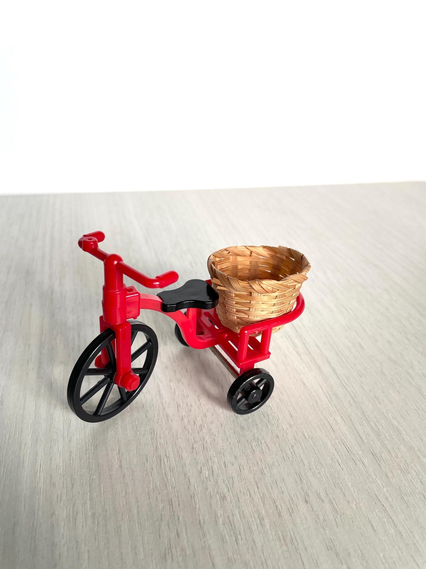 Vintage Sylvanian red bicycle with wicker basket, Calico Critters Collector's item from the United Kingdom