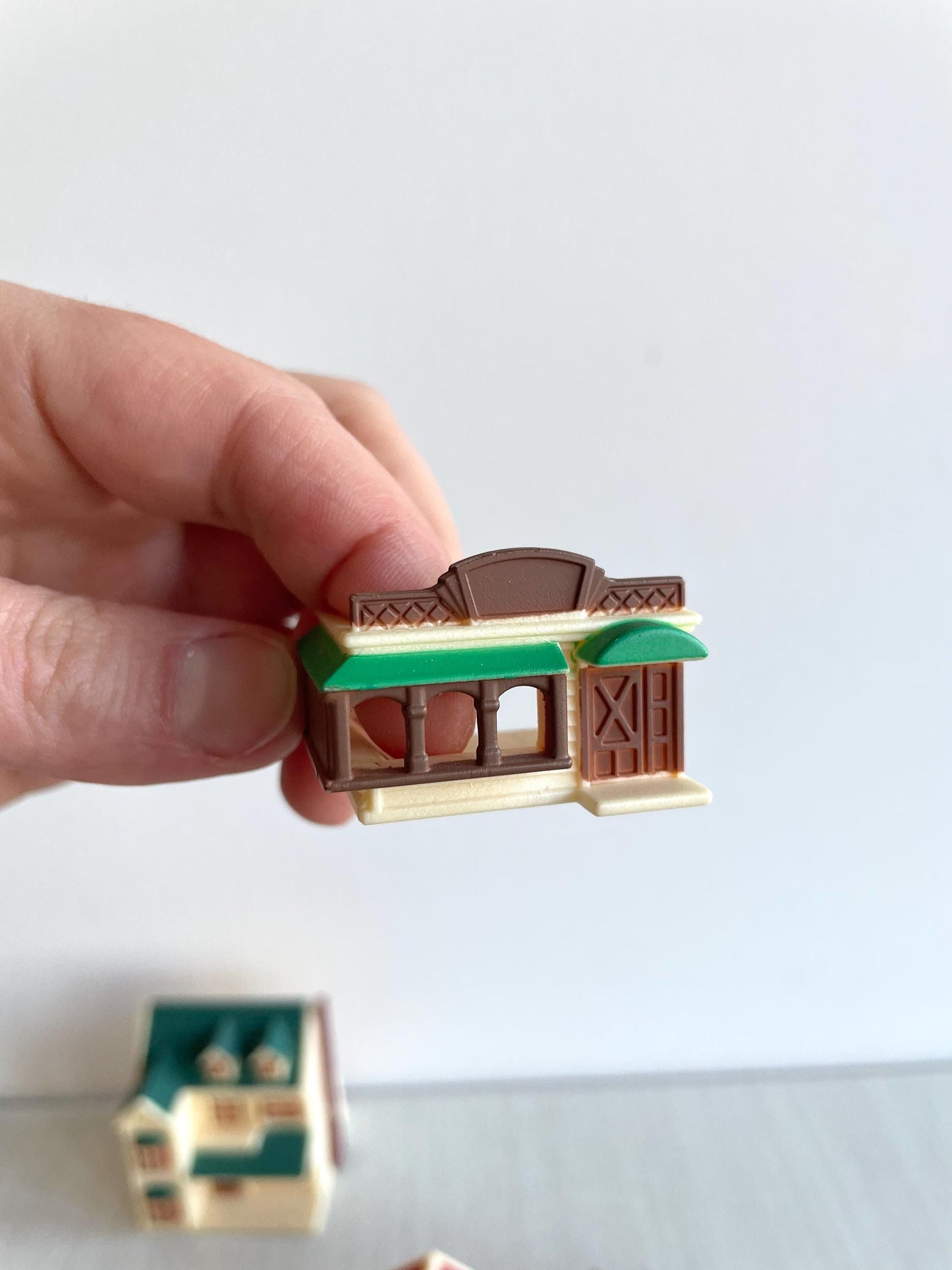 Miniature dollhouse replacement parts from vintage Sylvanian Toy Shop, Calico Critters tiny dollhouses with toy boxes and magazines