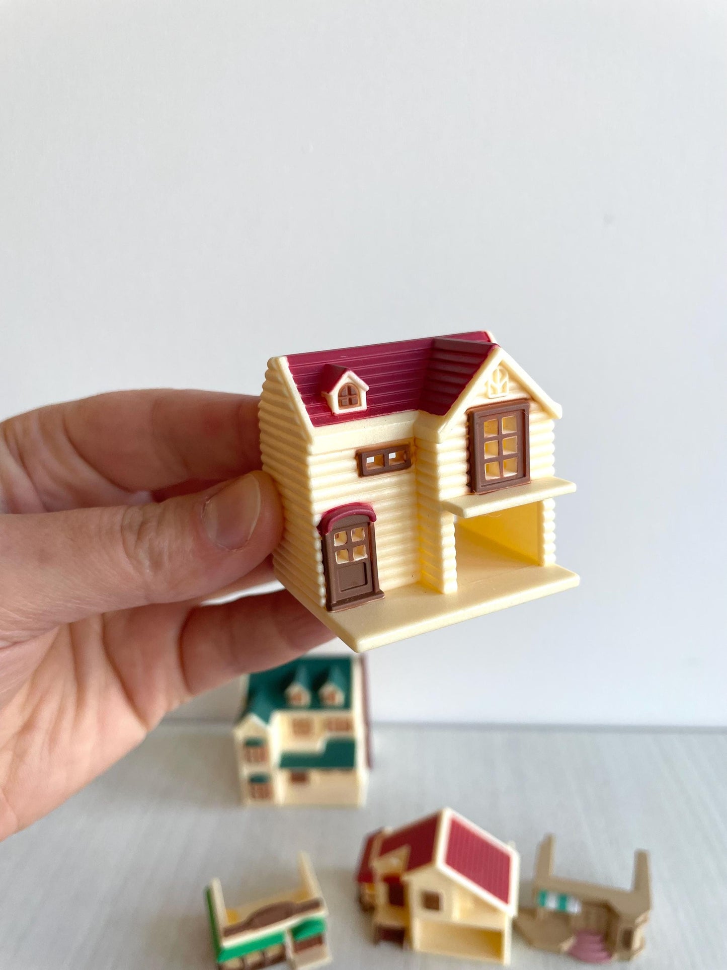 Miniature dollhouse replacement parts from vintage Sylvanian Toy Shop, Calico Critters tiny dollhouses with toy boxes and magazines