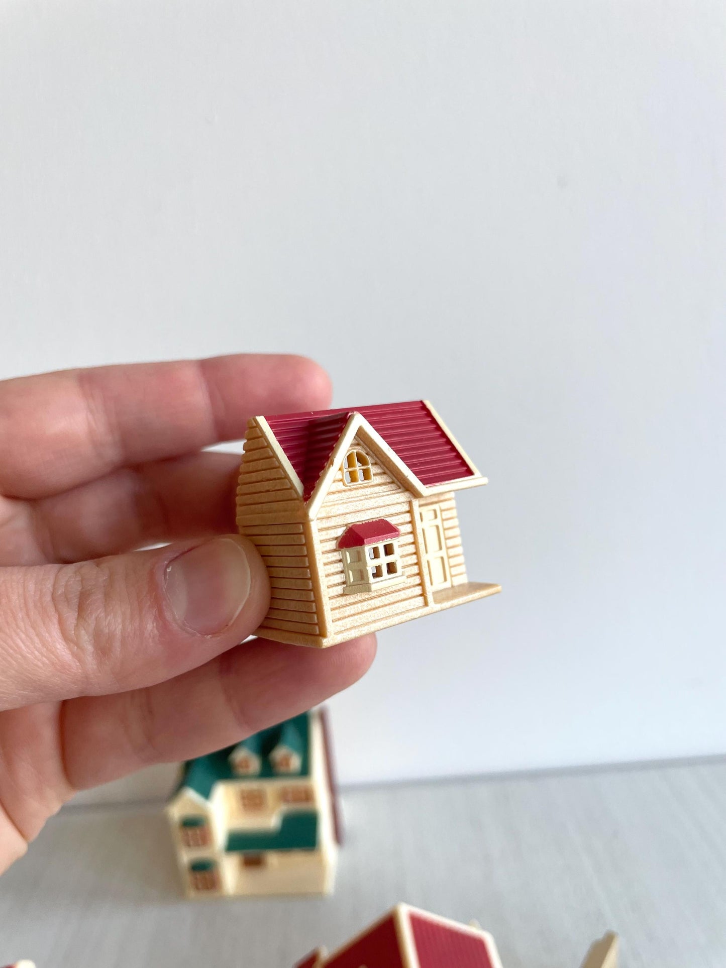 Miniature dollhouse replacement parts from vintage Sylvanian Toy Shop, Calico Critters tiny dollhouses with toy boxes and magazines