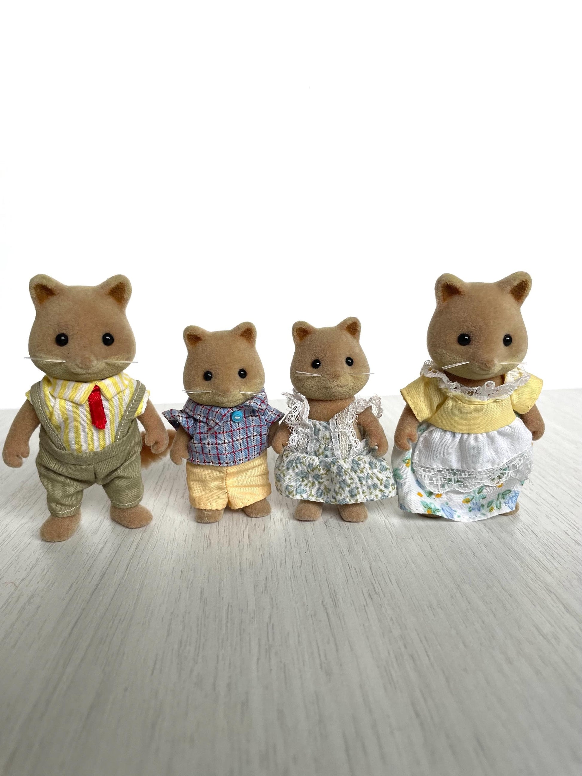 Vintage Sylvanian Families Honey Fox Family in original clothes — Calico Critters collectible