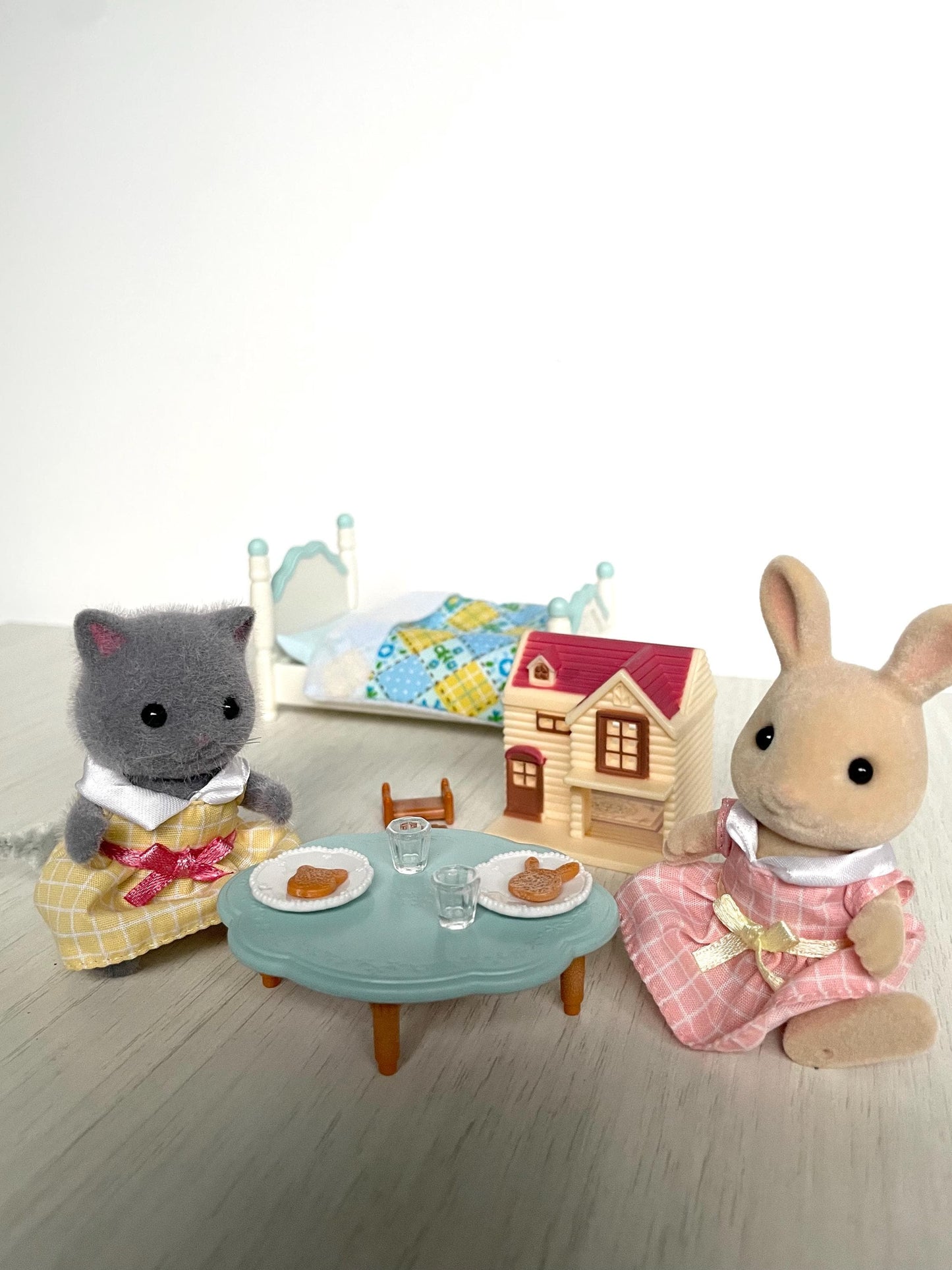Miniature Calico Critters dollhouse and girl's bedroom set with blue bed, tea time party table & grey Persian cat girl + sweet pea rabbit