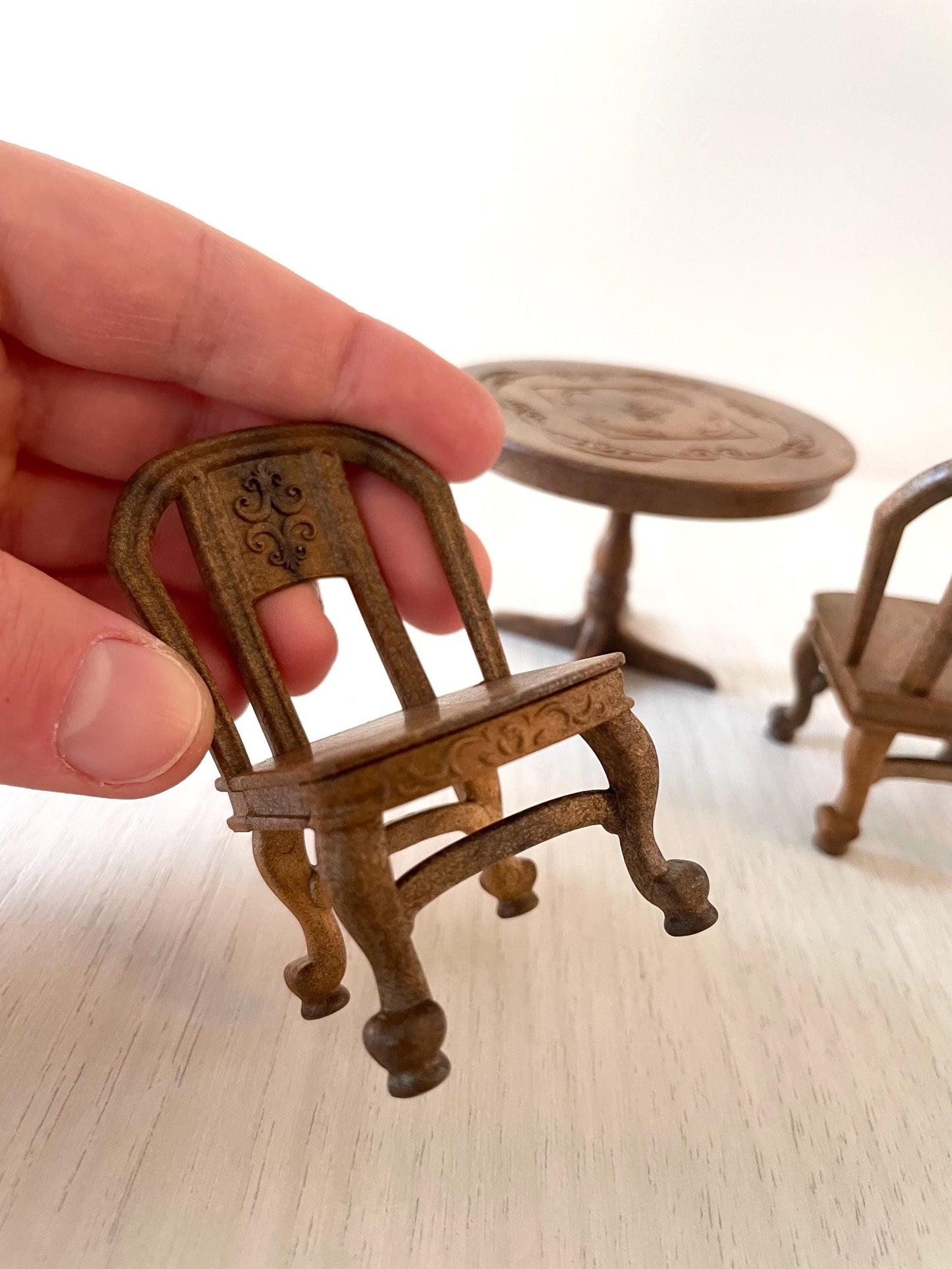 Dark brown ornate Calico Critters table with two chairs, new — Sylvanian Families