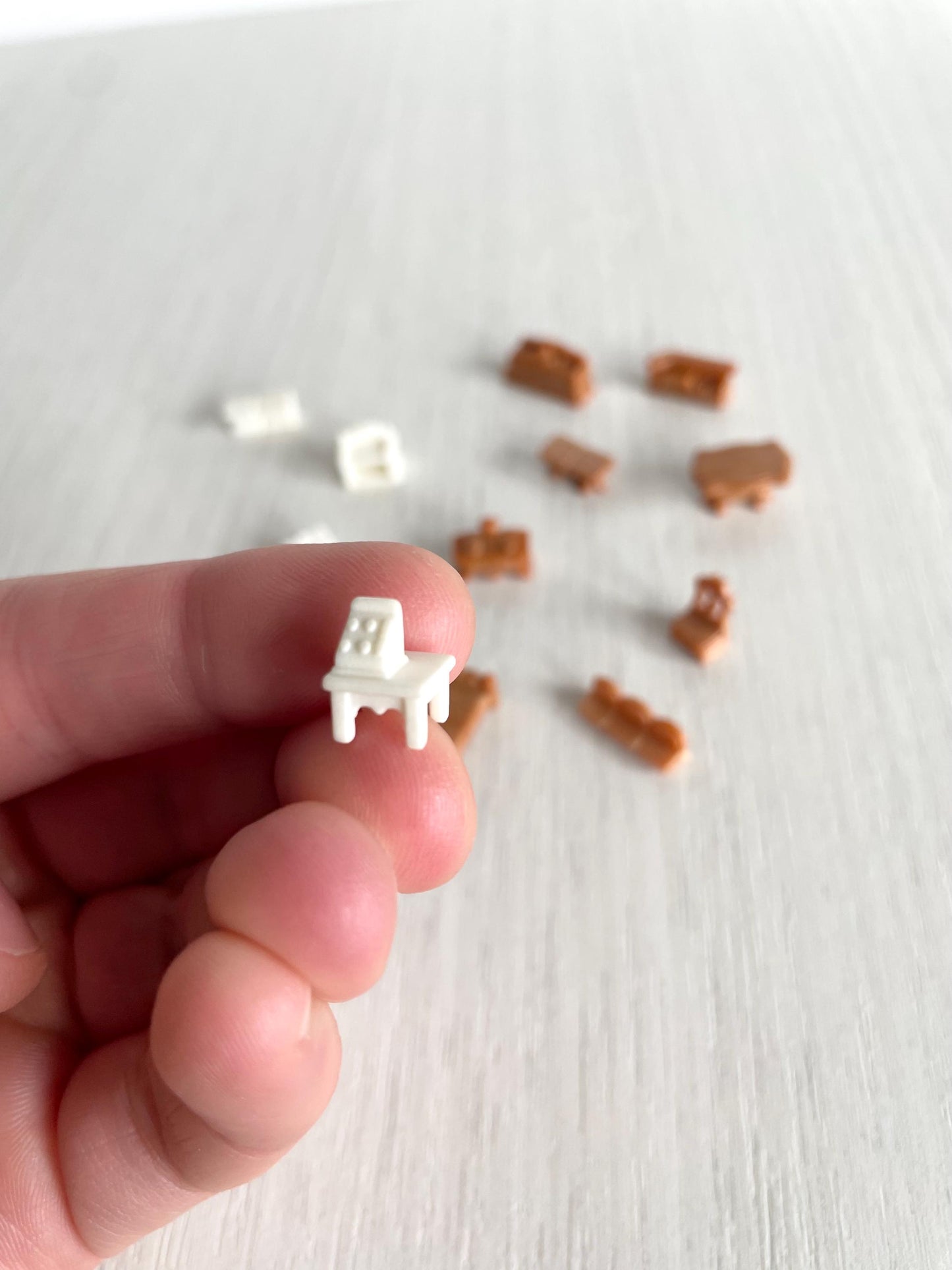 Miniature dollhouse furniture replacement parts from vintage Sylvanian Toy Shop, Calico Critters tiny brown and white furniture