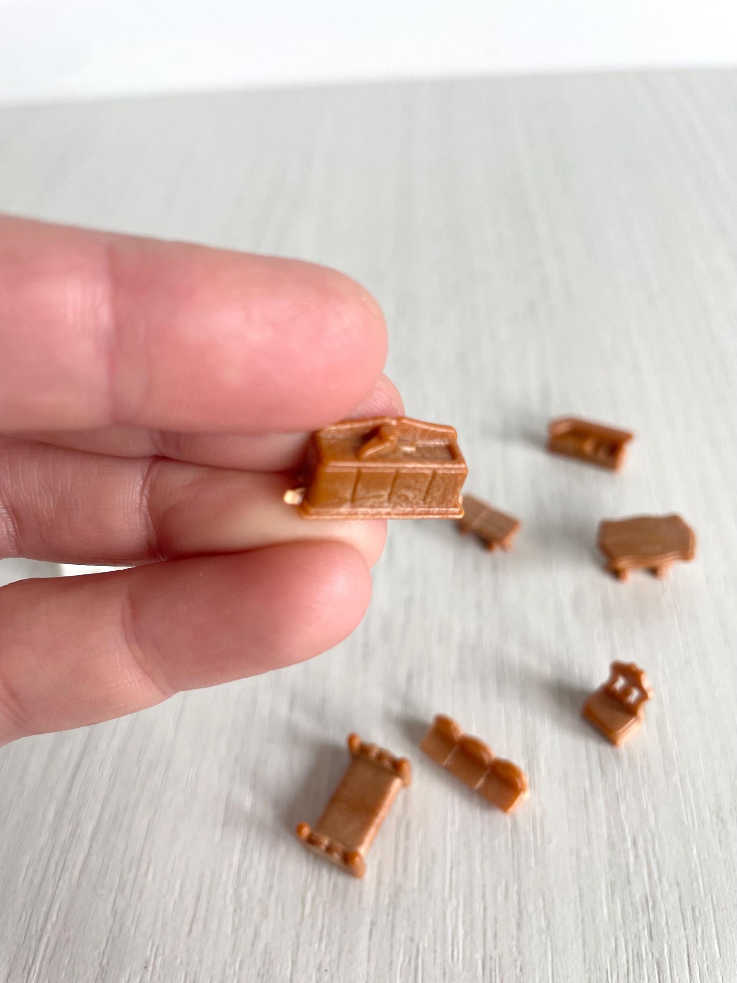 Miniature dollhouse furniture replacement parts from vintage Sylvanian Toy Shop, Calico Critters tiny brown and white furniture