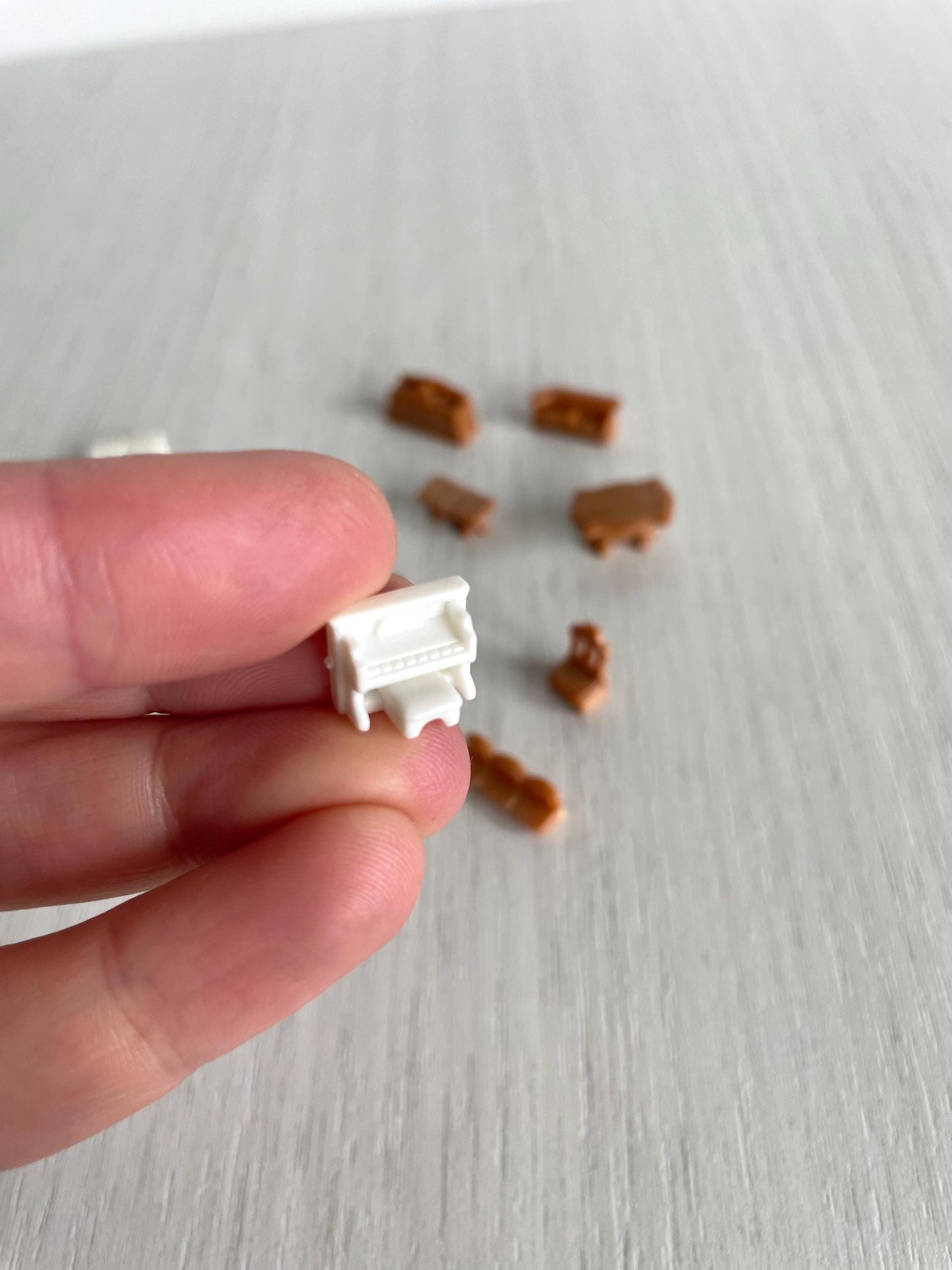 Miniature dollhouse furniture replacement parts from vintage Sylvanian Toy Shop, Calico Critters tiny brown and white furniture