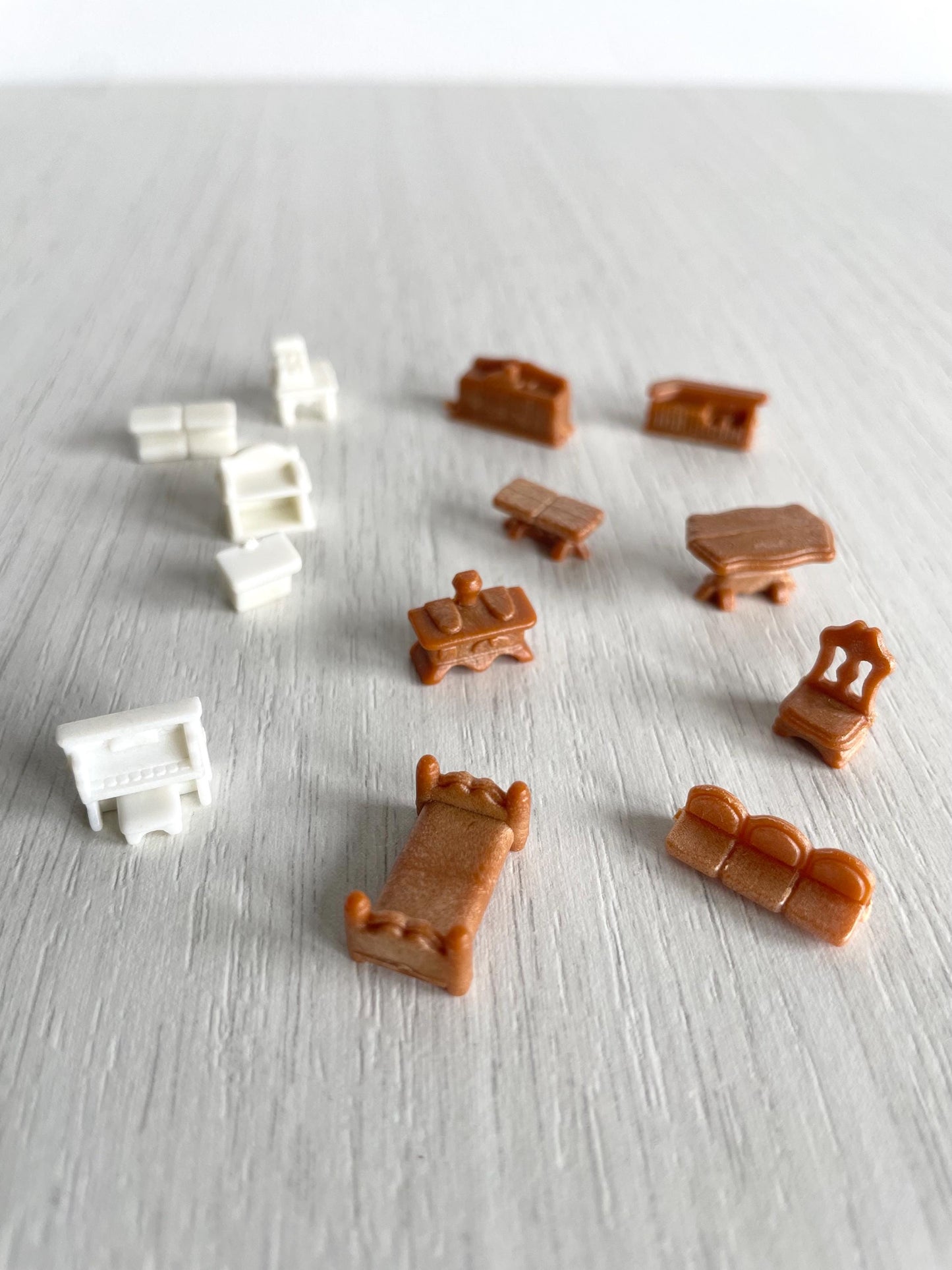 Miniature dollhouse furniture replacement parts from vintage Sylvanian Toy Shop, Calico Critters tiny brown and white furniture