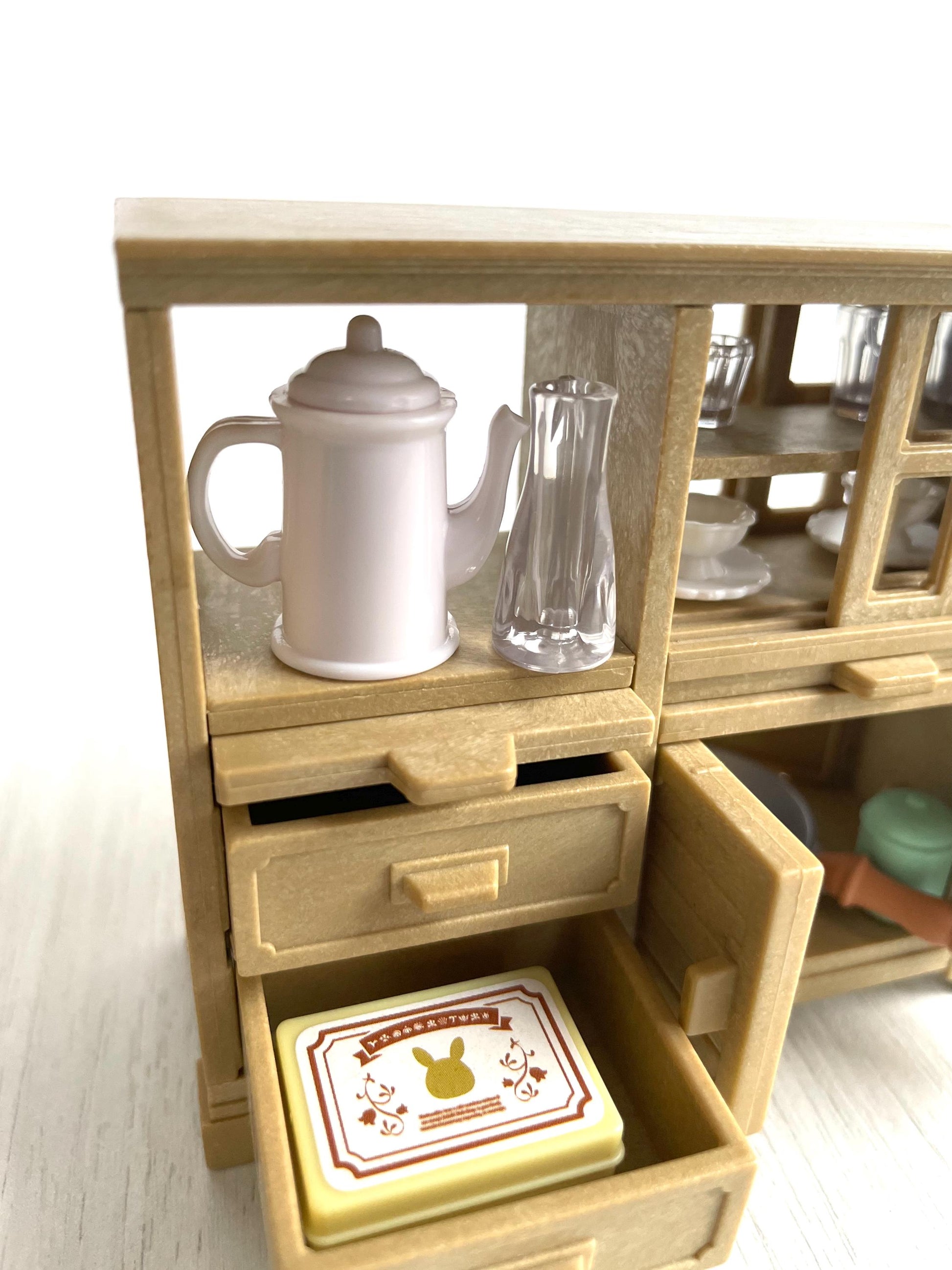 Miniature dollhouse dish cabinet detail — Sylvanian Families / Calico Critters