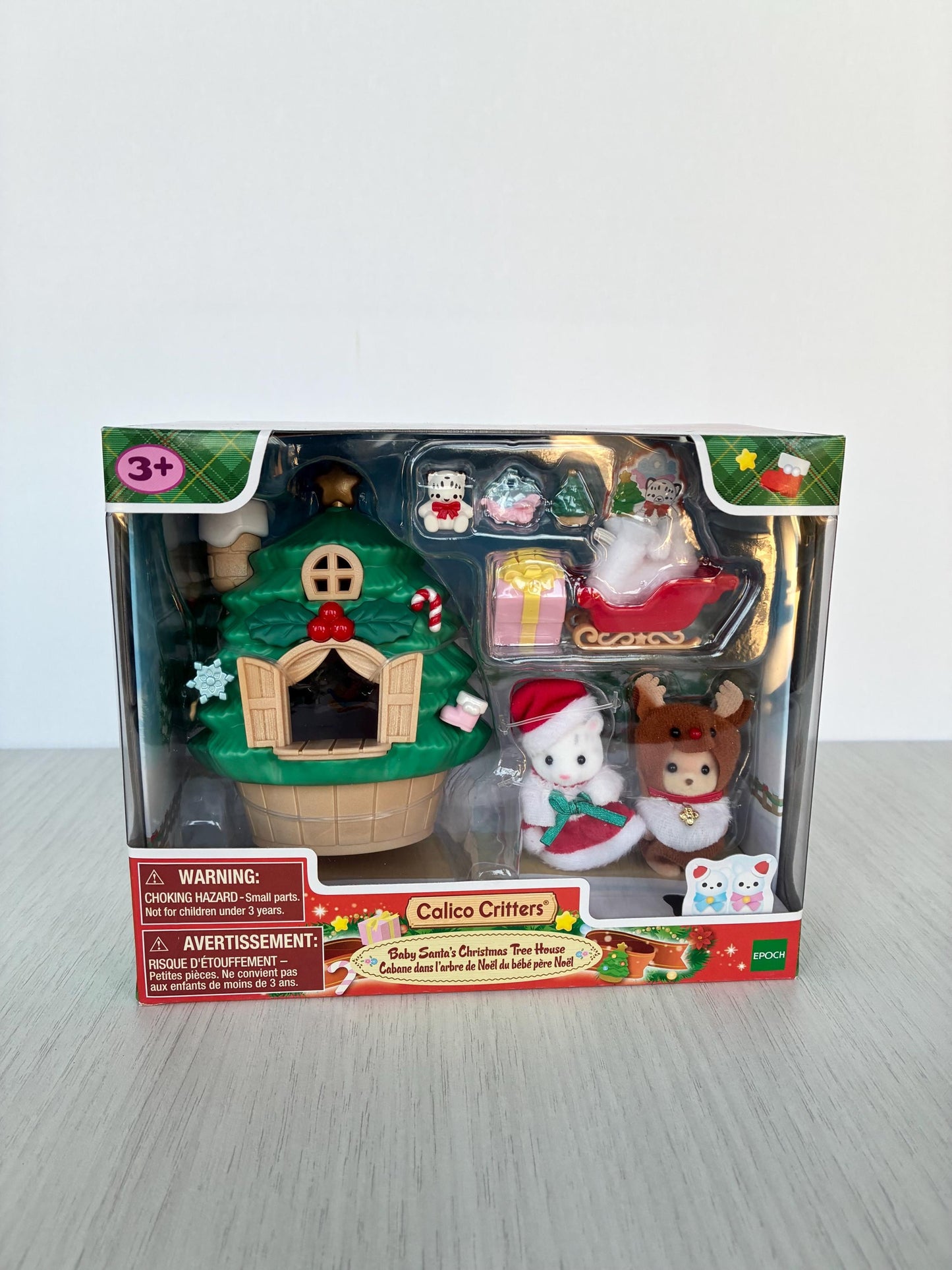 Baby Santa's Christmas Treehouse: Limited Edition Calico Critters winter themed set with snow leopard and caramel dog babies in costumes