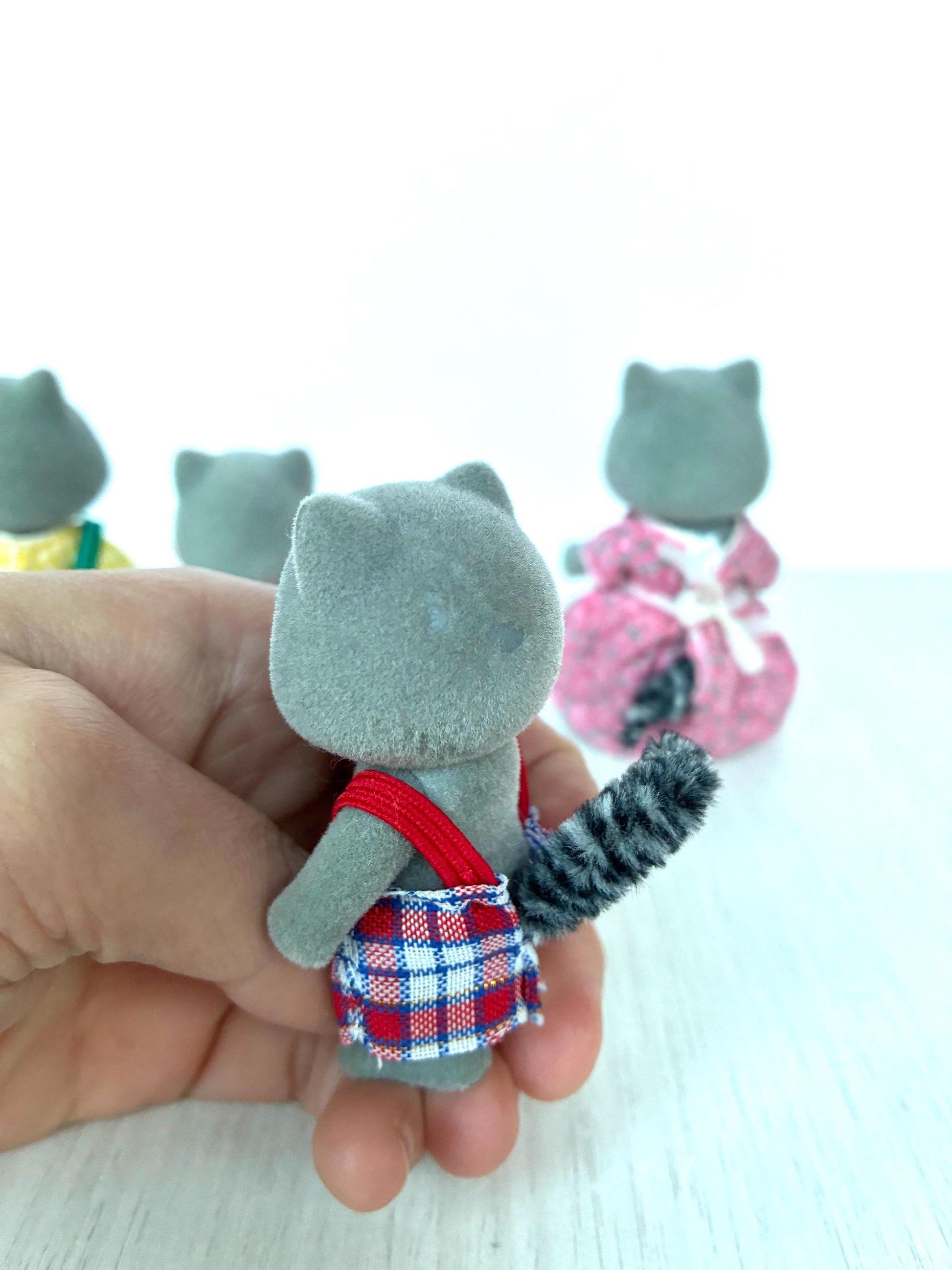 Vintage Chestnut Raccoon Sylvanian Families figurines with gripping hands — Calico Critters
