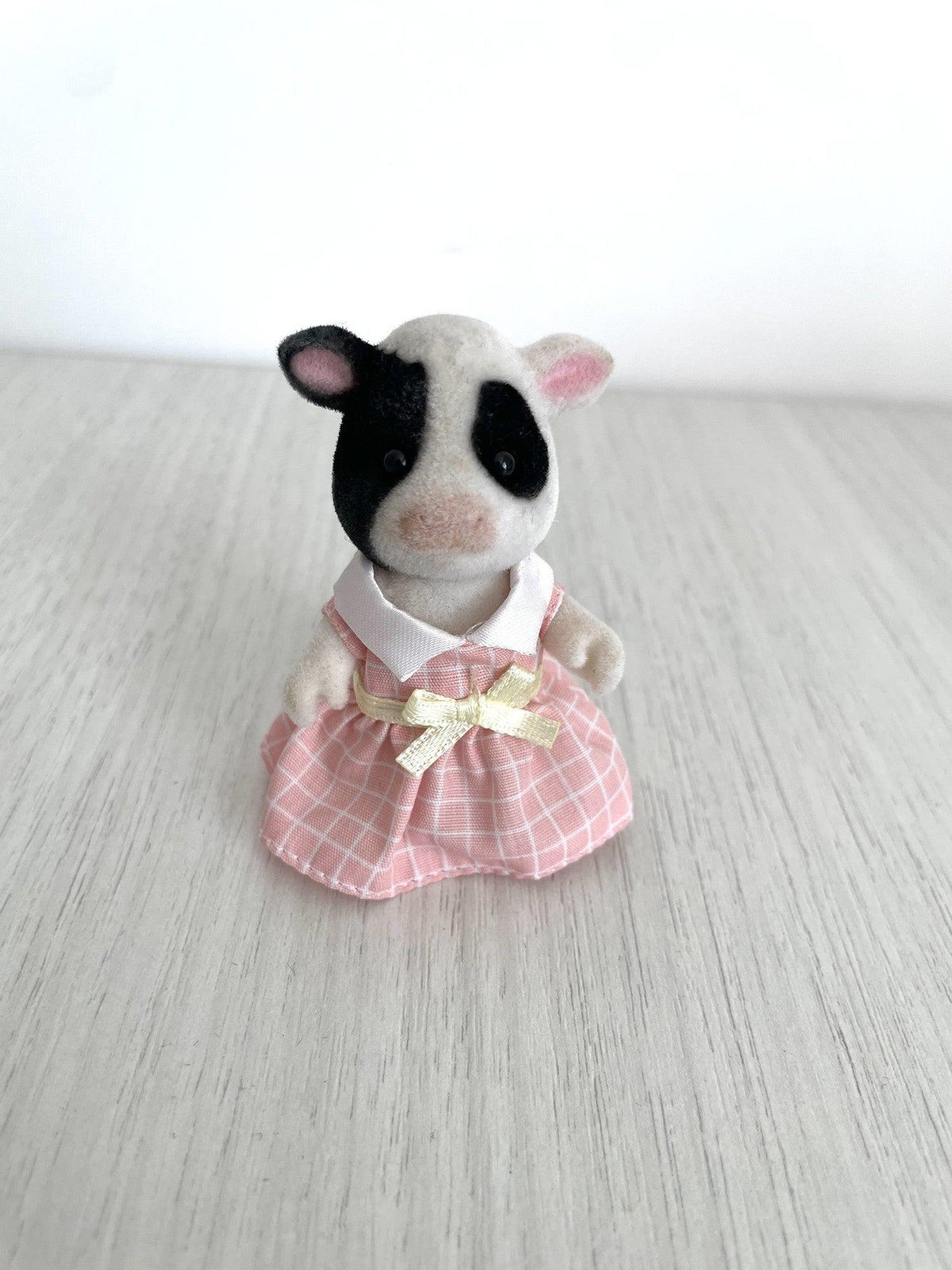 Vintage cow girl in pink check dress standing, front view — Calico Critters and Sylvanian Families