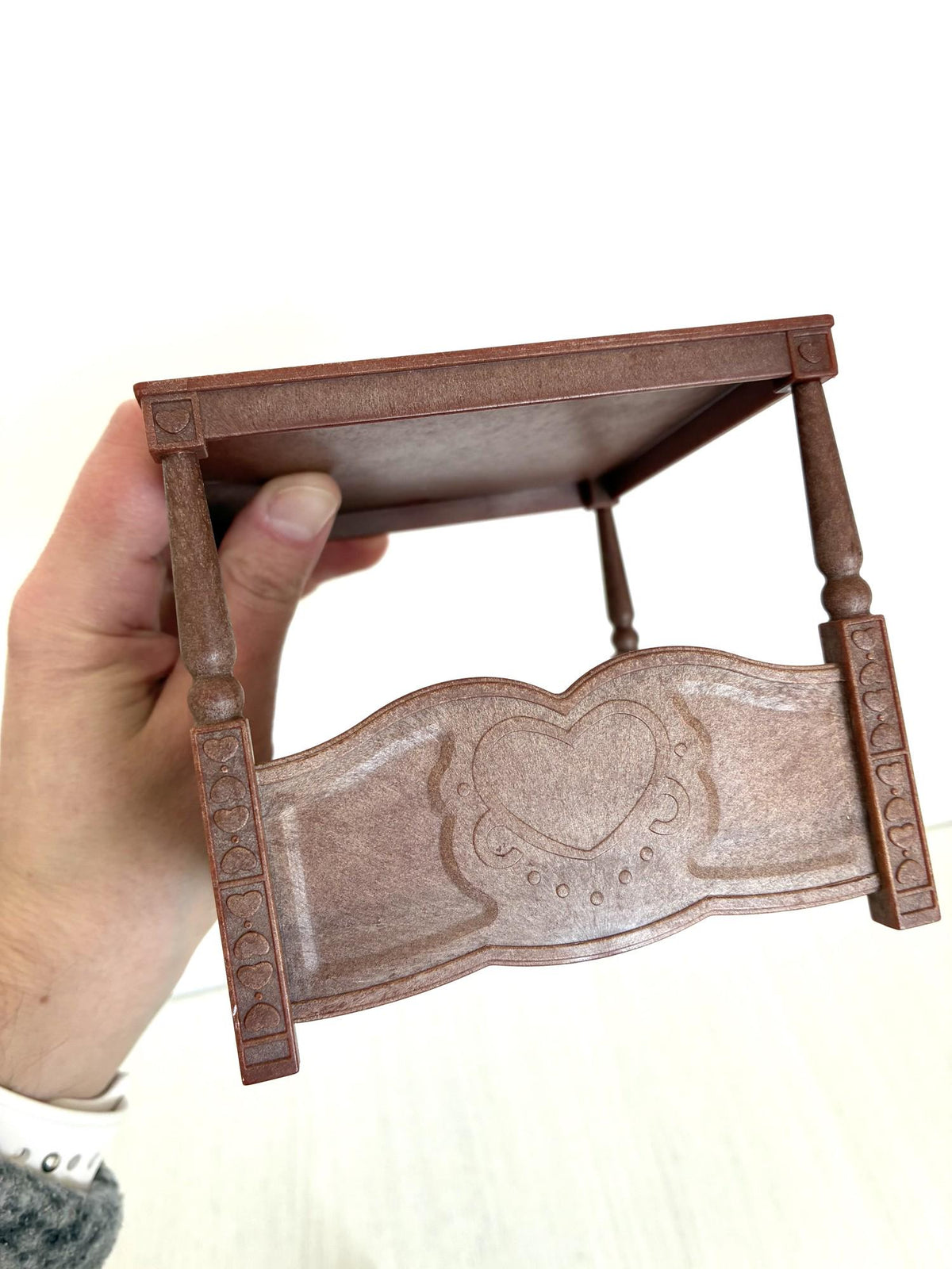 Calico Critters Sylvanian Families four poster bed footboard detail held in hand