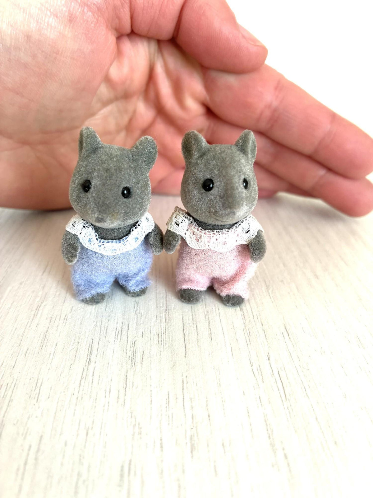 Calico Critters Sylvanian Families grey mouse baby twins in blue and pink rompers, standing pair, front view